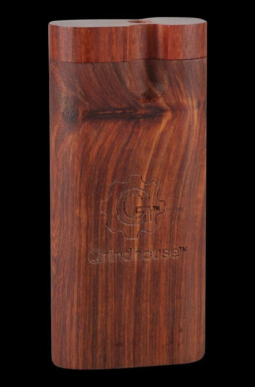 A close-up, angled view of the Pulsar Straight Wood Dugout in rosewood, showcasing its smooth grain and rectangular form.