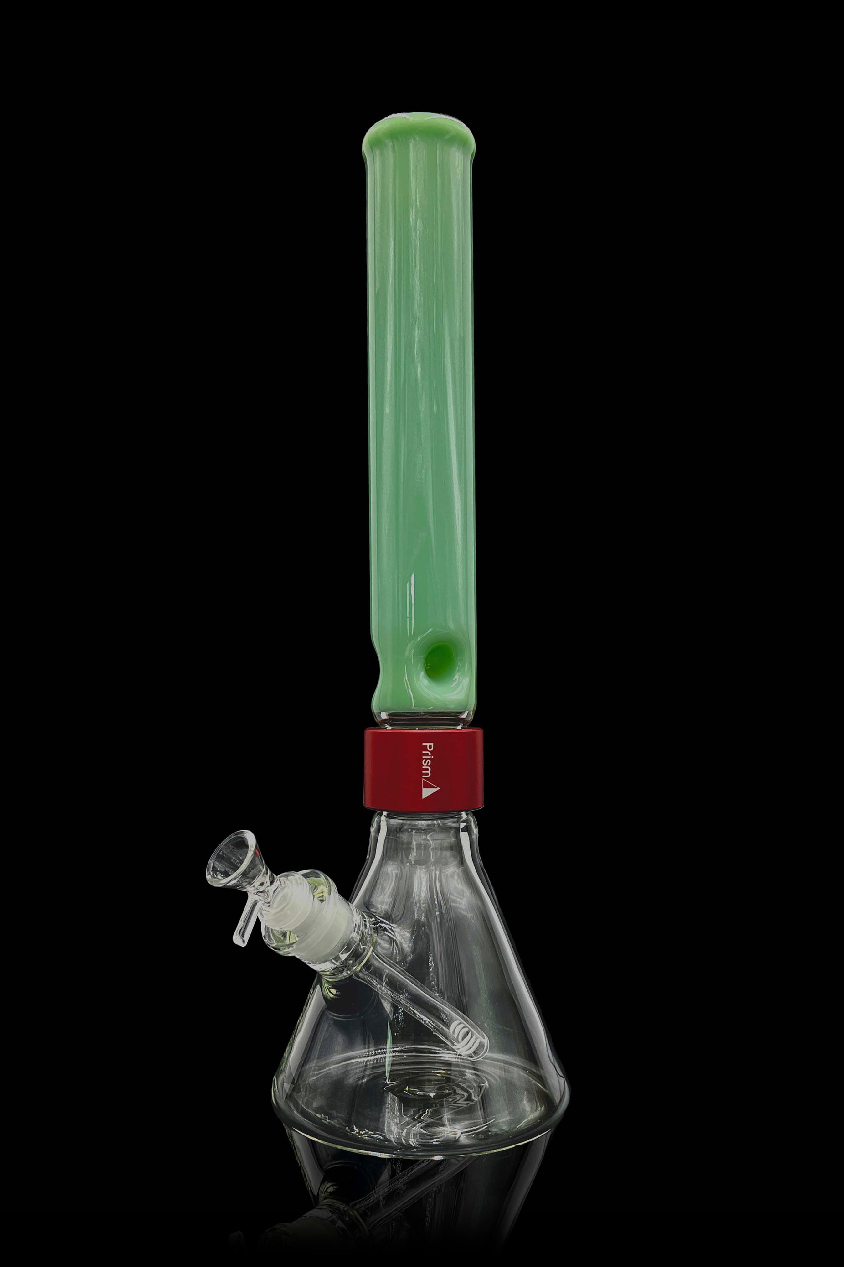 Green glass bong with a red accent and clear glass downstem, isolated on a black background.