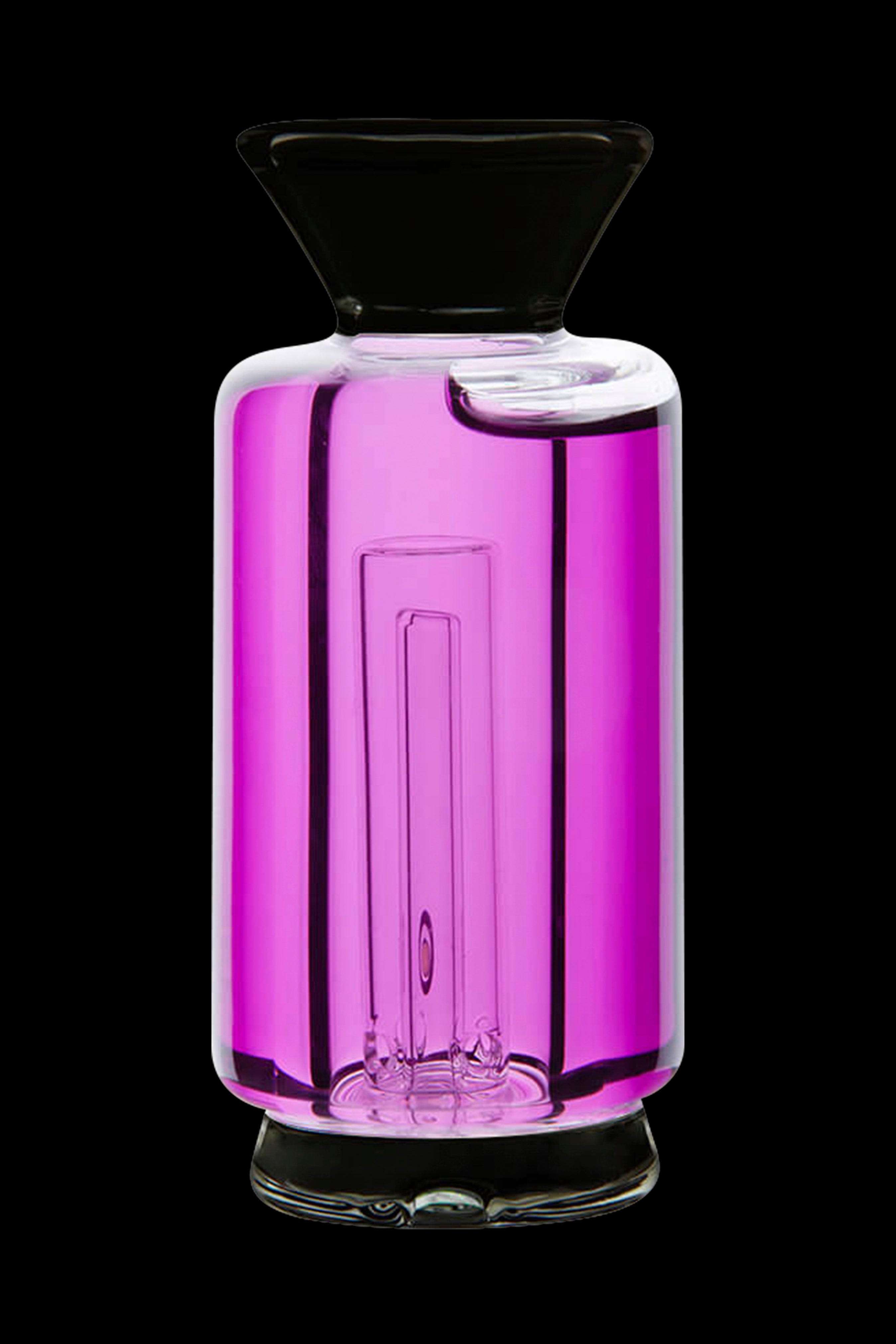 Glowing pink glass water pipe with intricate internal diffusion system.