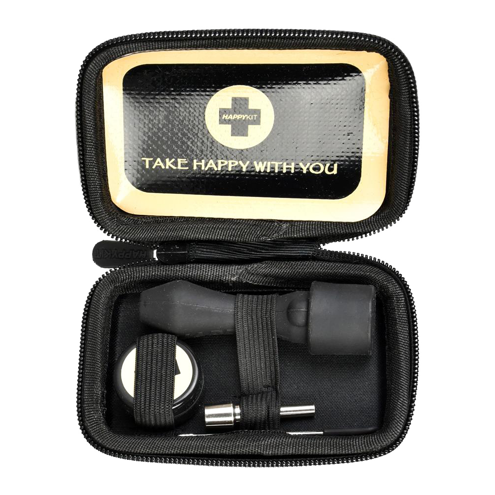 The Happy Dab Kit Mini is pictured open, displaying its black interior and compact carrying case design from a top-down angle.