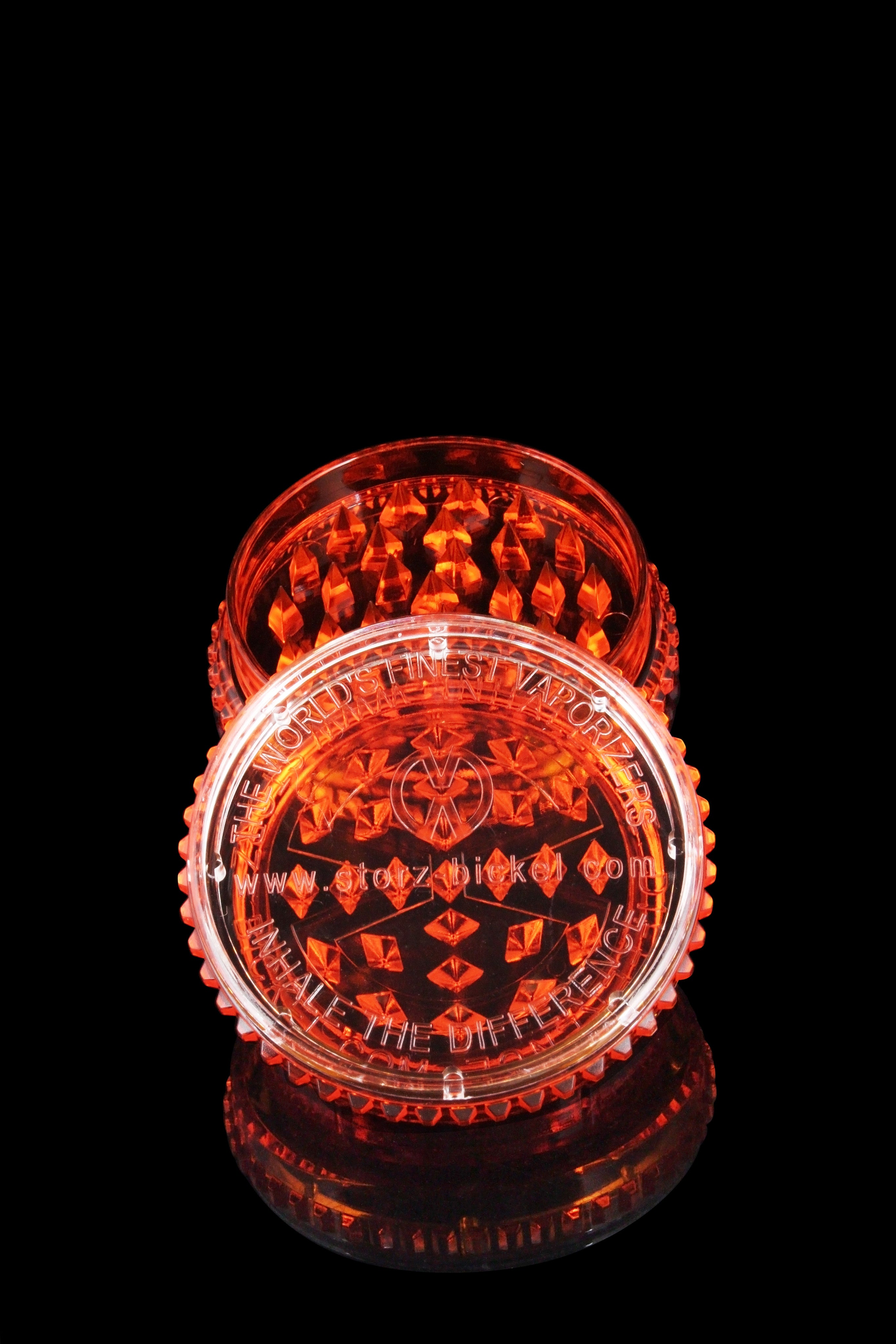 A close-up, angled view showcases the Storz & Bickel Plenty Vaporizer with a sleek, modern design against a dark background.