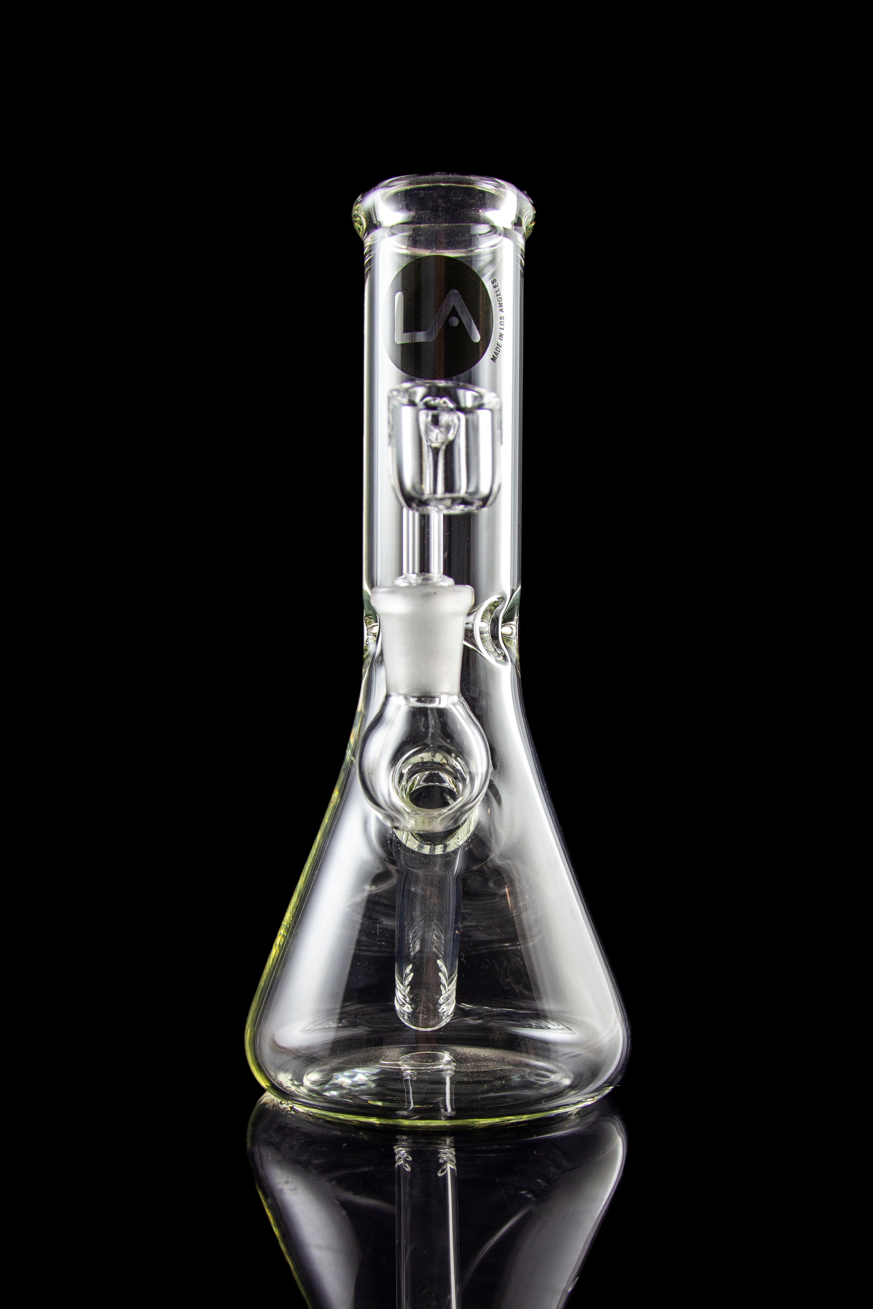Clear glass water pipe (bong) with ice catch and brand logo, studio shot.