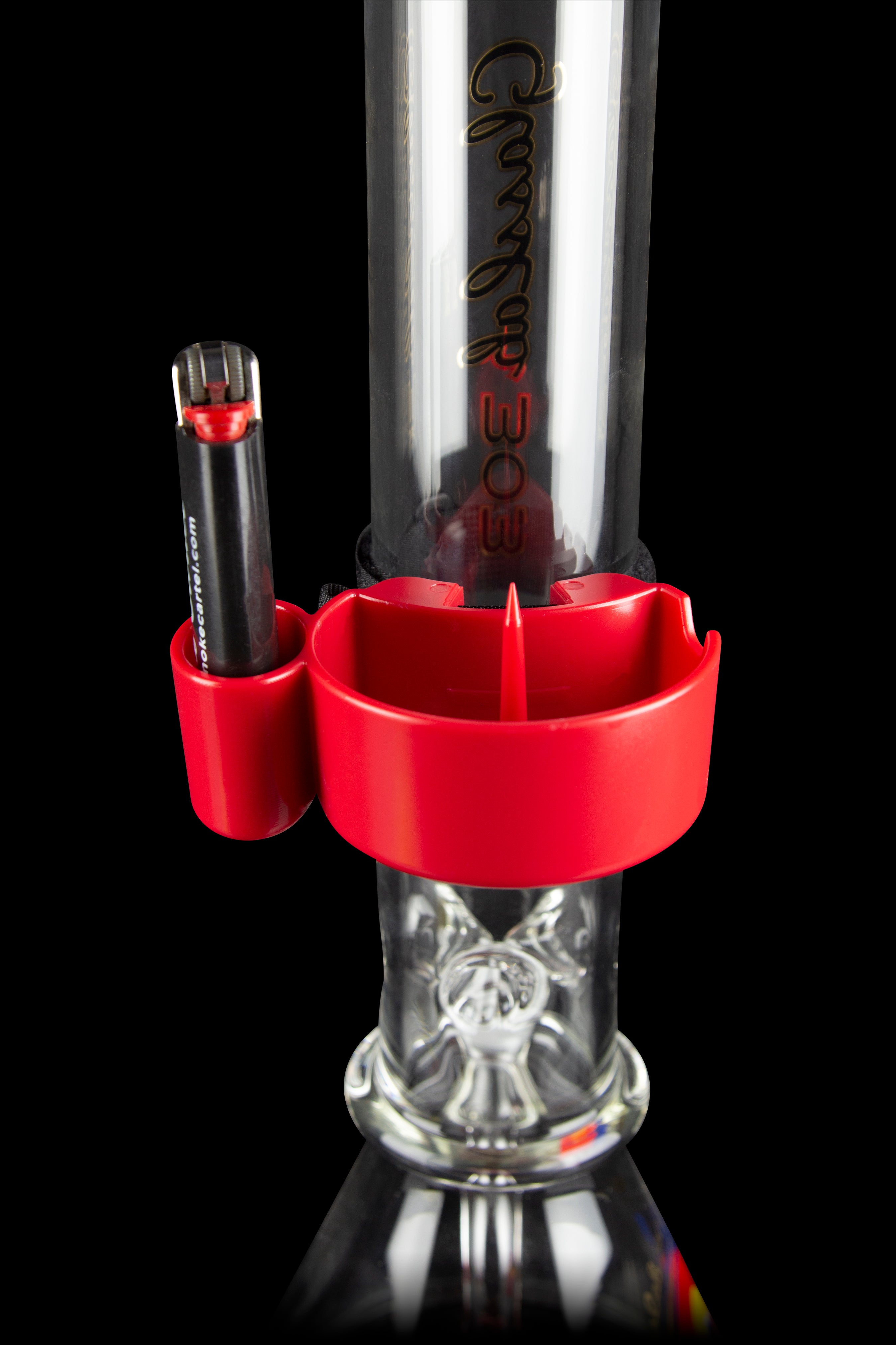 Red silicone attachment for a glass water pipe with a cannabis concentrate dab rig insert.