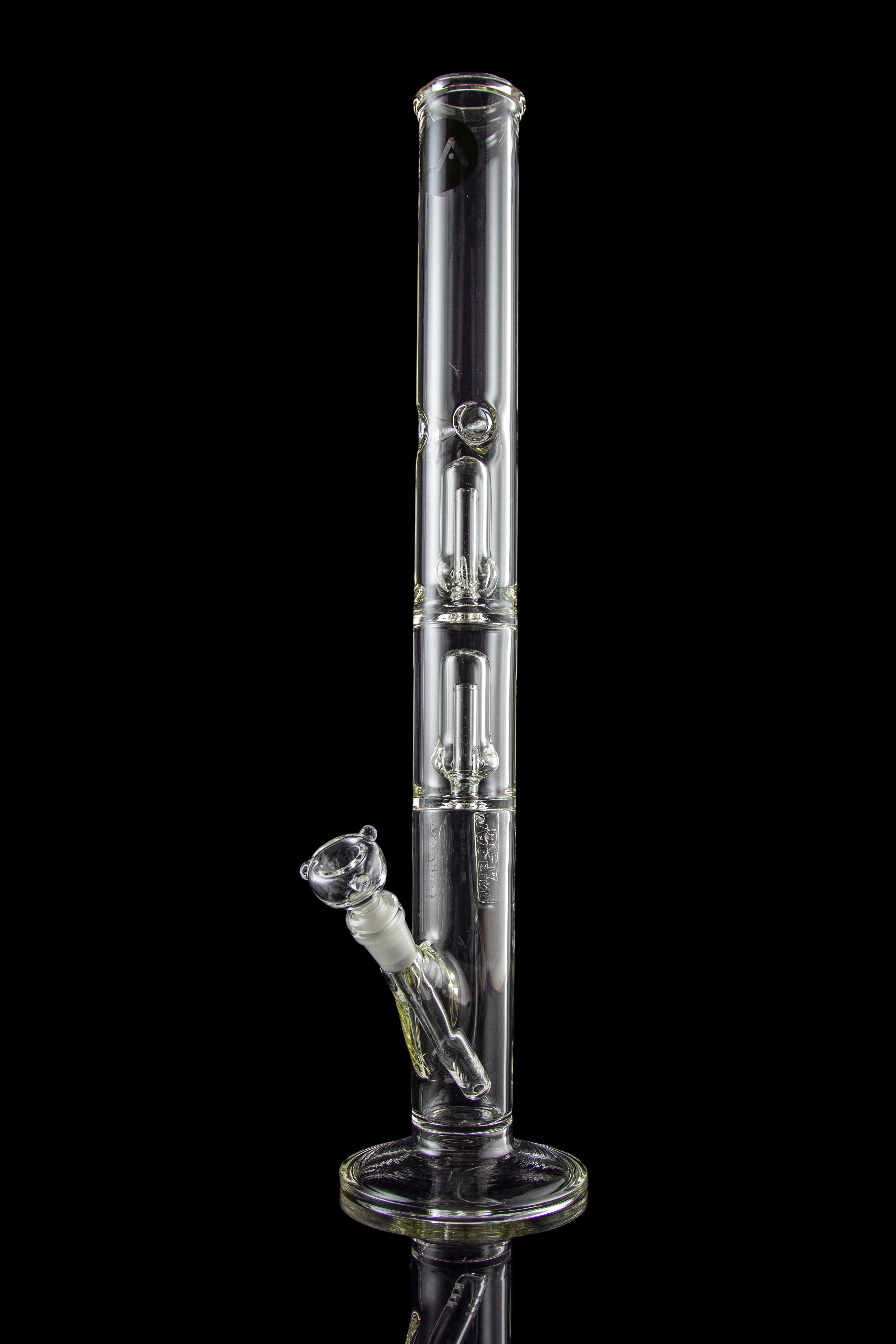 A front view of the LA Pipes Thick Glass Straight Tube Bong with Showerhead Perc, showcasing its clear glass construction and tall, cylindrical shape.