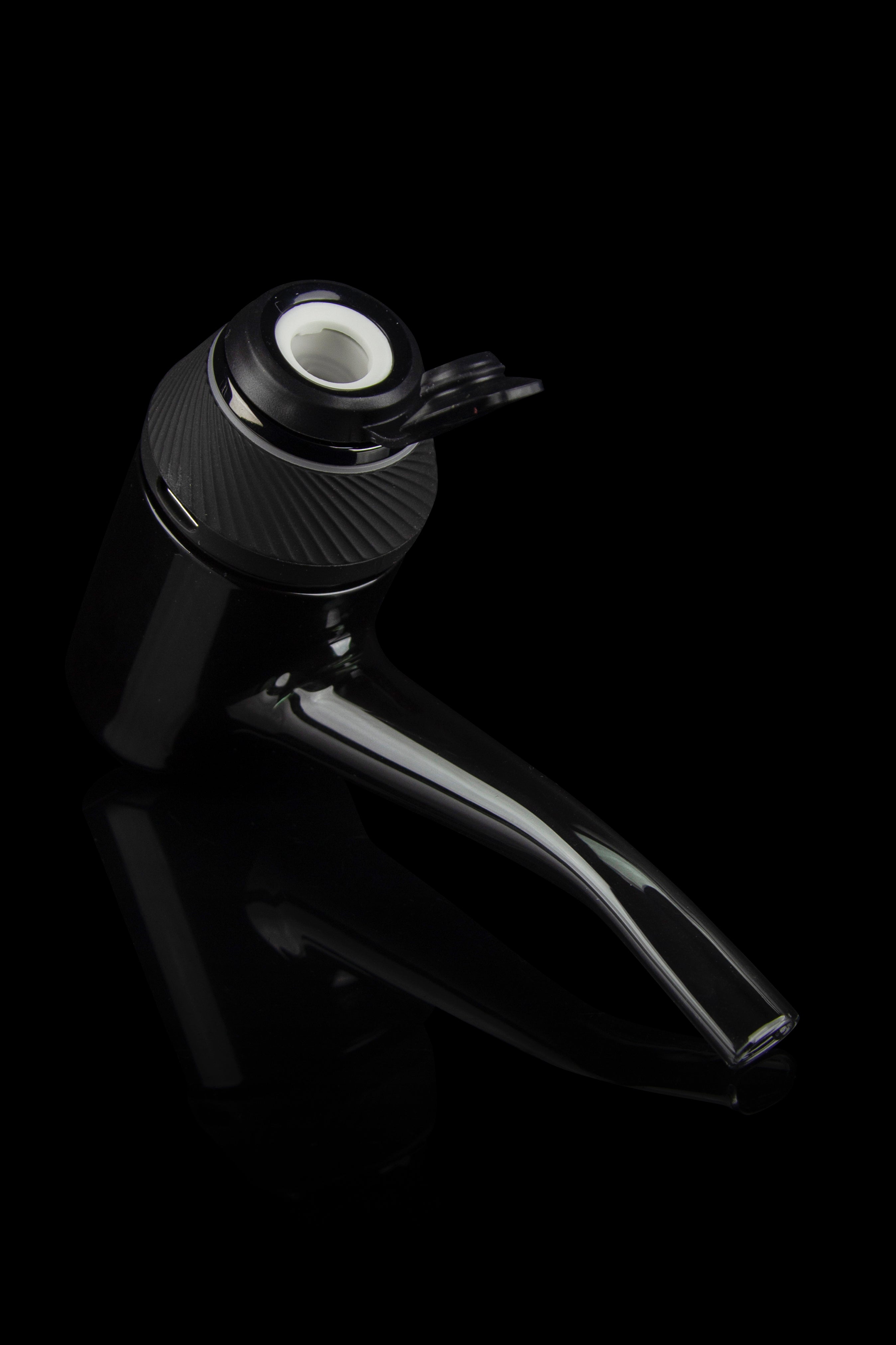 Sleek black glass cannabis oil burner pipe on a dark background.