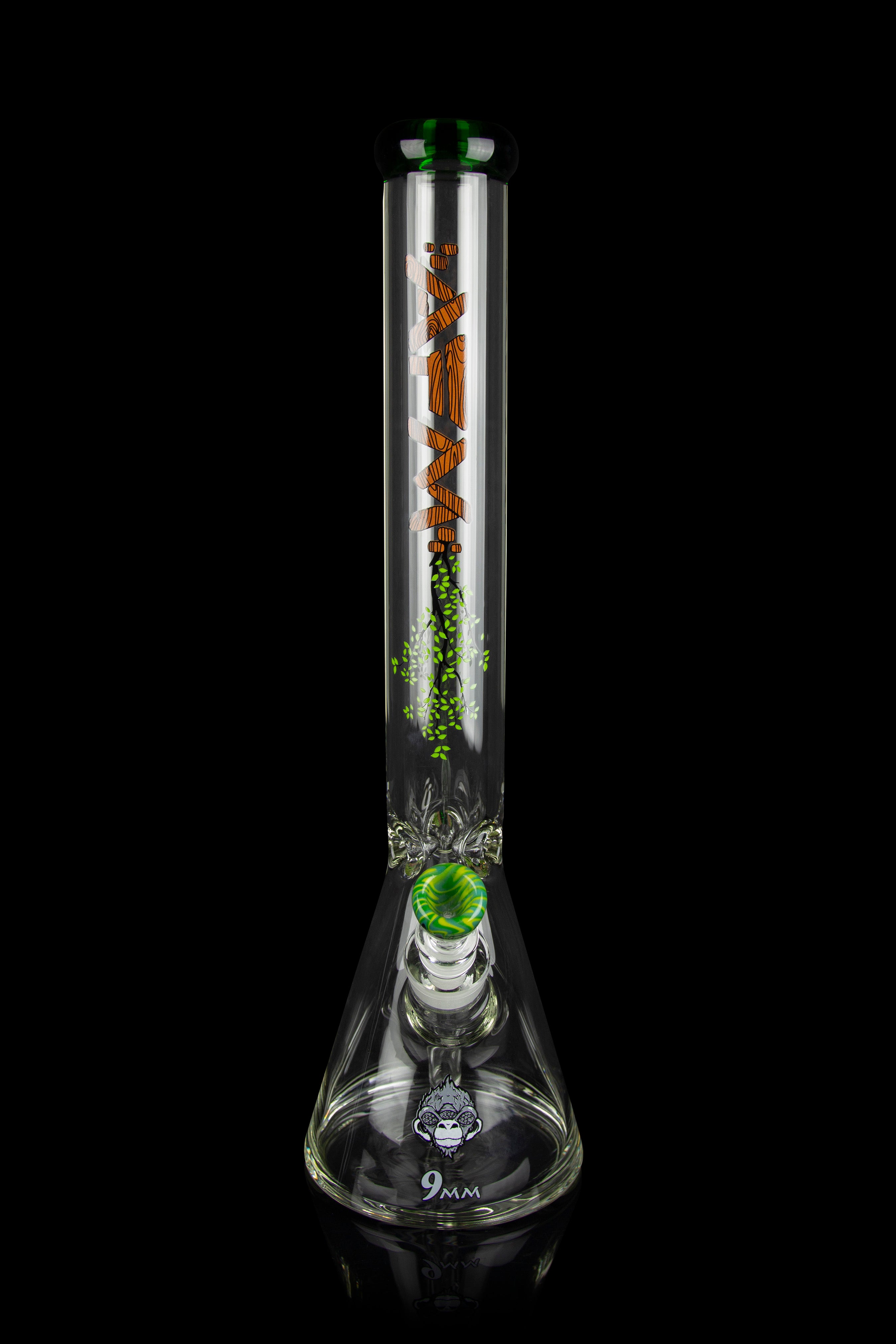 Glass bong with intricate orange and green designs, studio shot on black background.