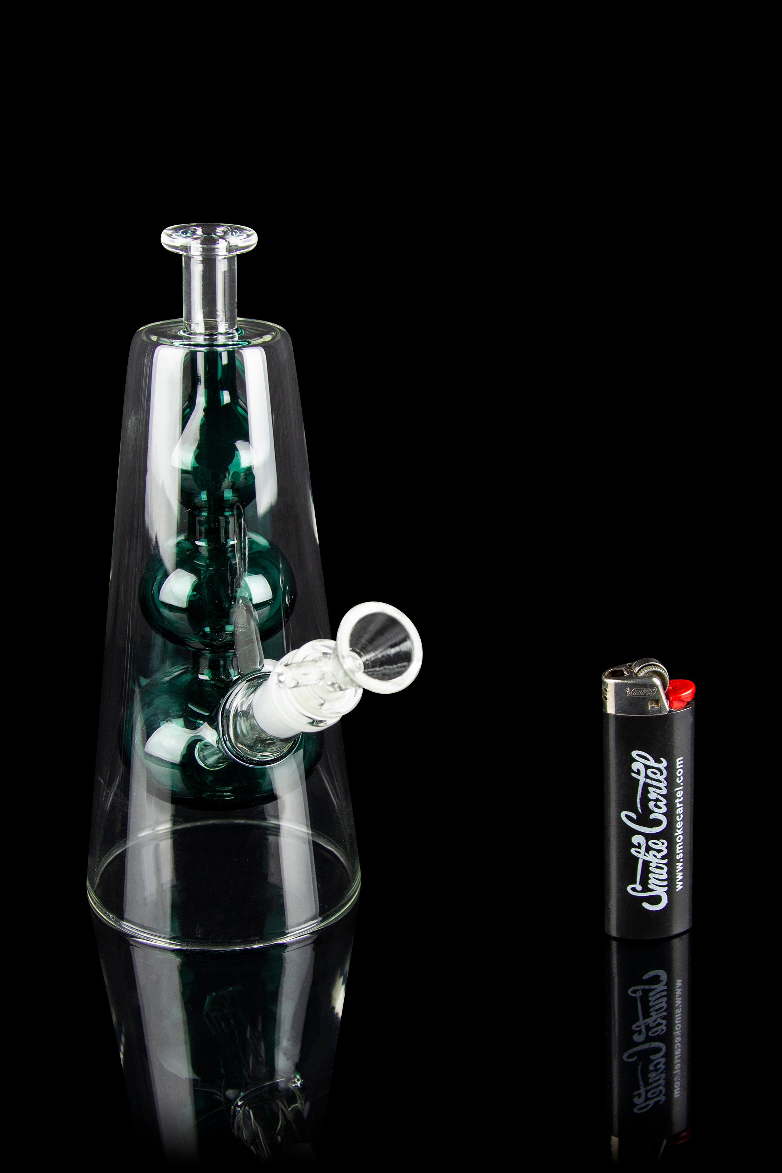Emerald green glass water pipe with smoke swirling inside, displayed with a lighter.