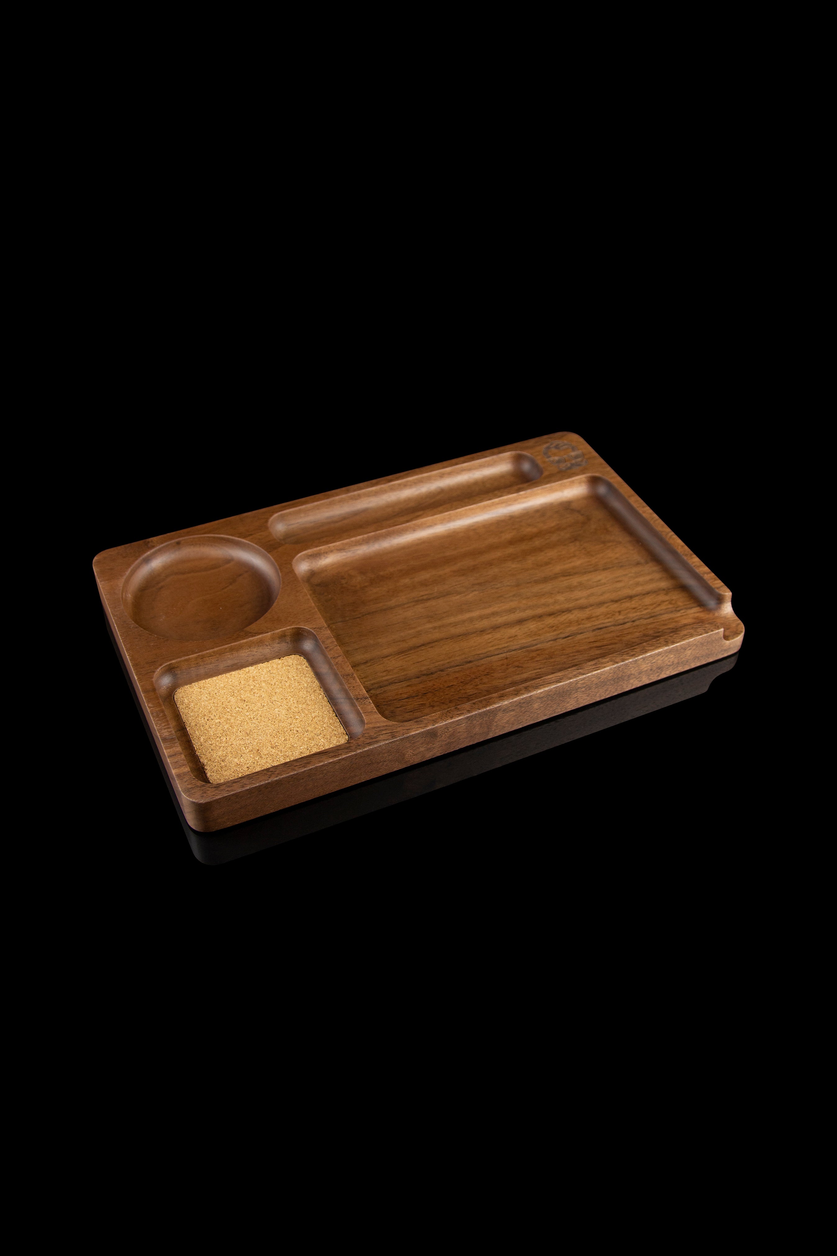Wooden rolling tray with divided compartments and a built-in grinder, isolated on a black background.