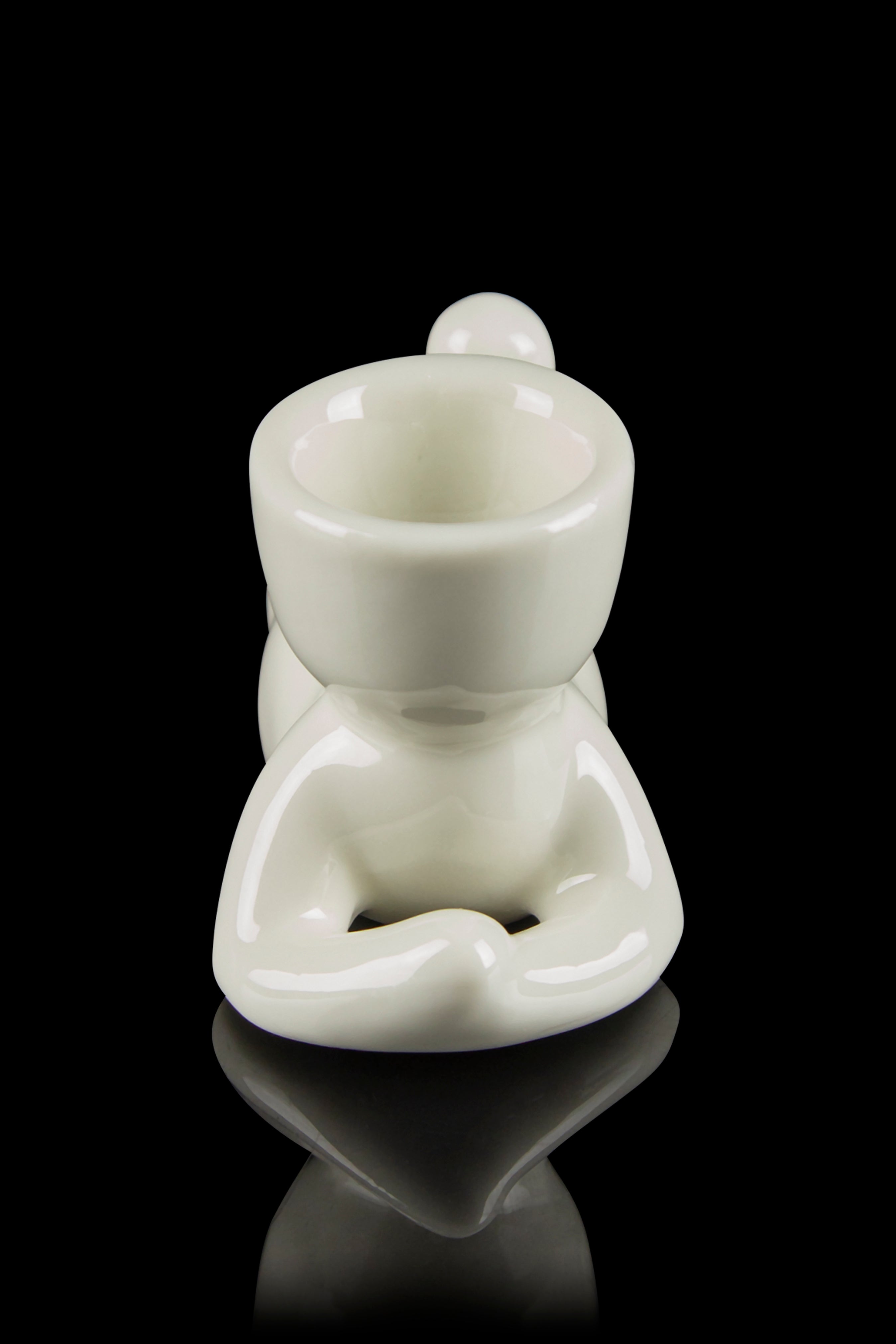 Frosted glass cannabis oil rig with a rounded base and bowl.