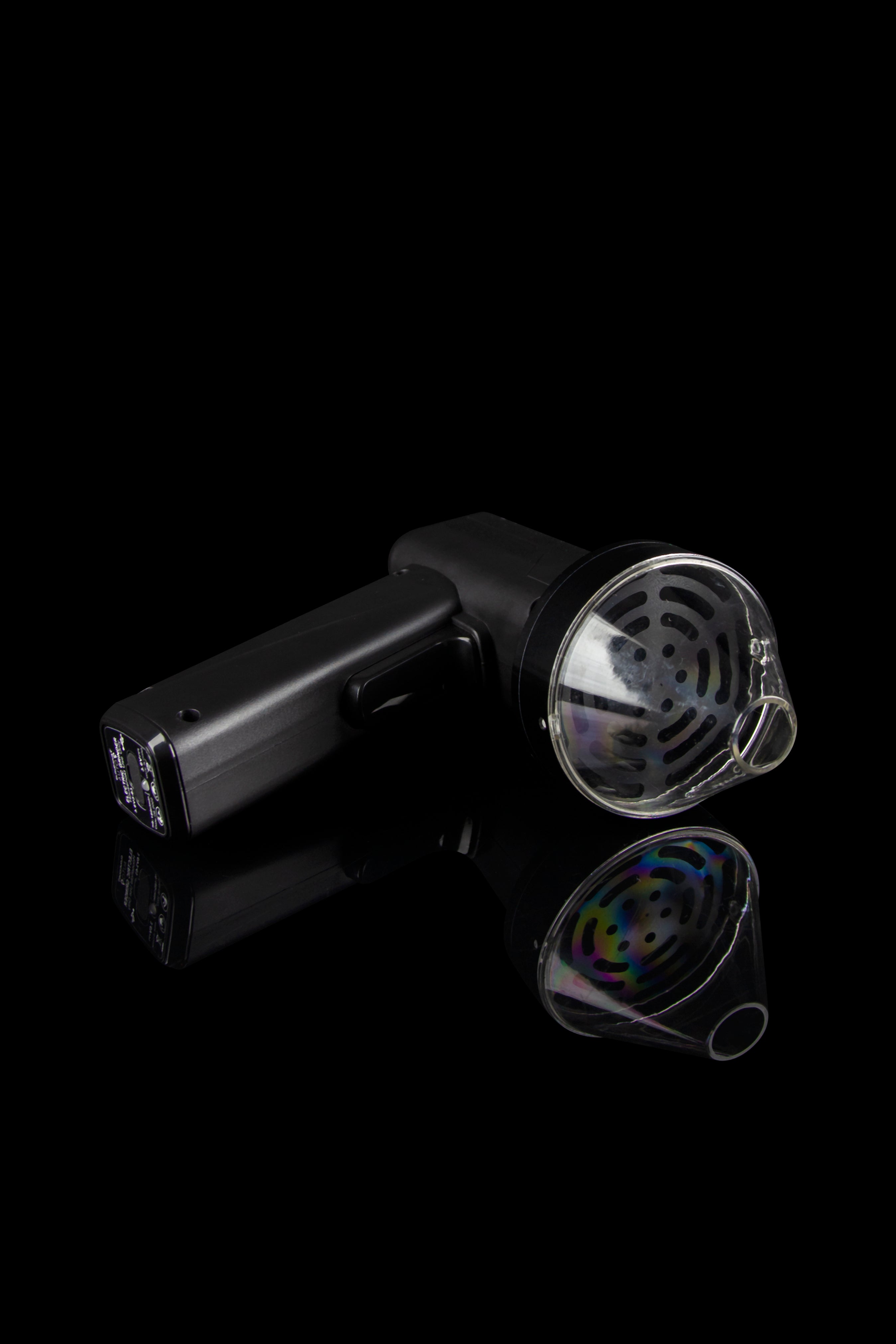 Black cannabis vaporizer with disassembled mouthpiece components against a dark background.