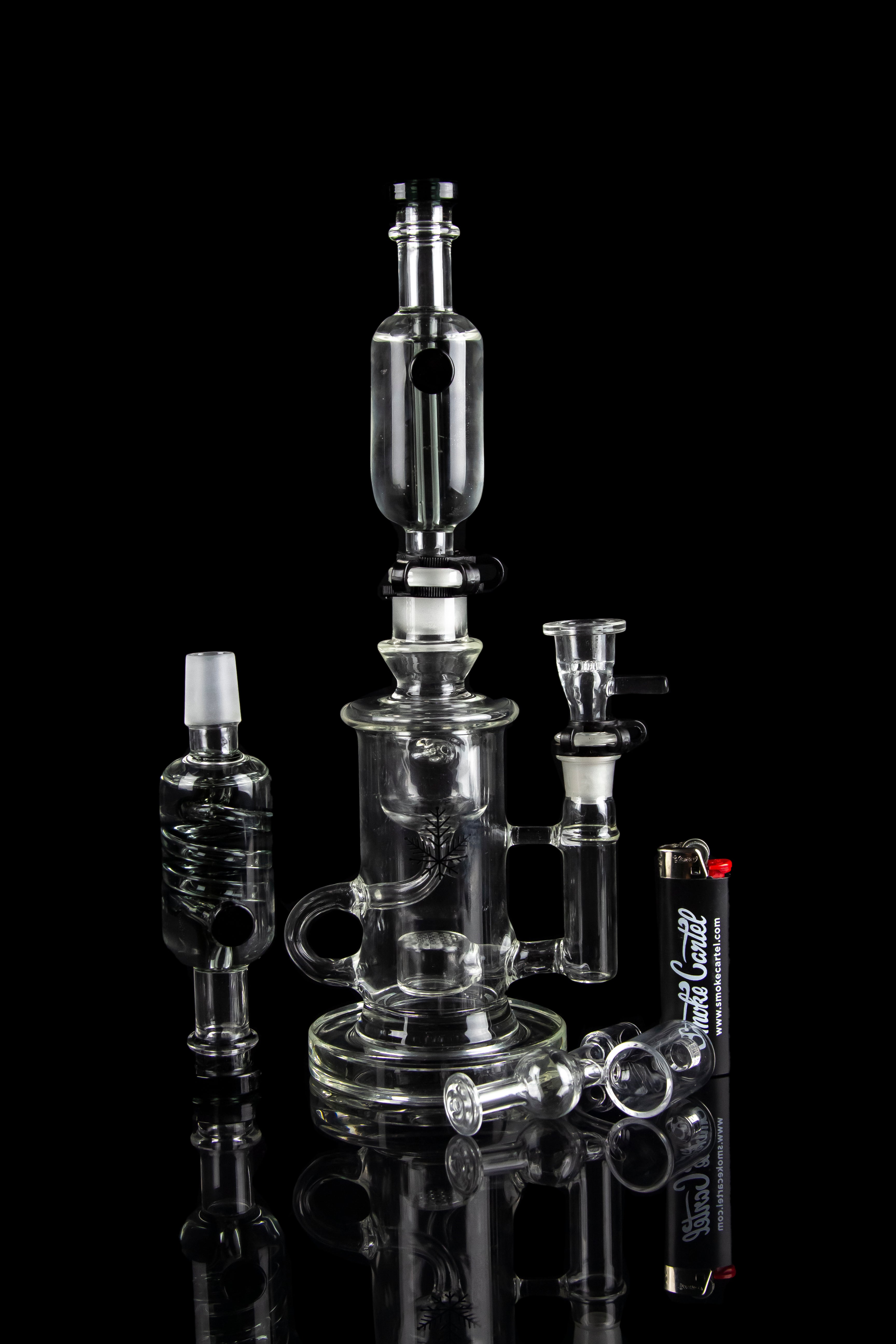 Clear glass water pipe (rig) with multiple chambers and percolators, studio shot.