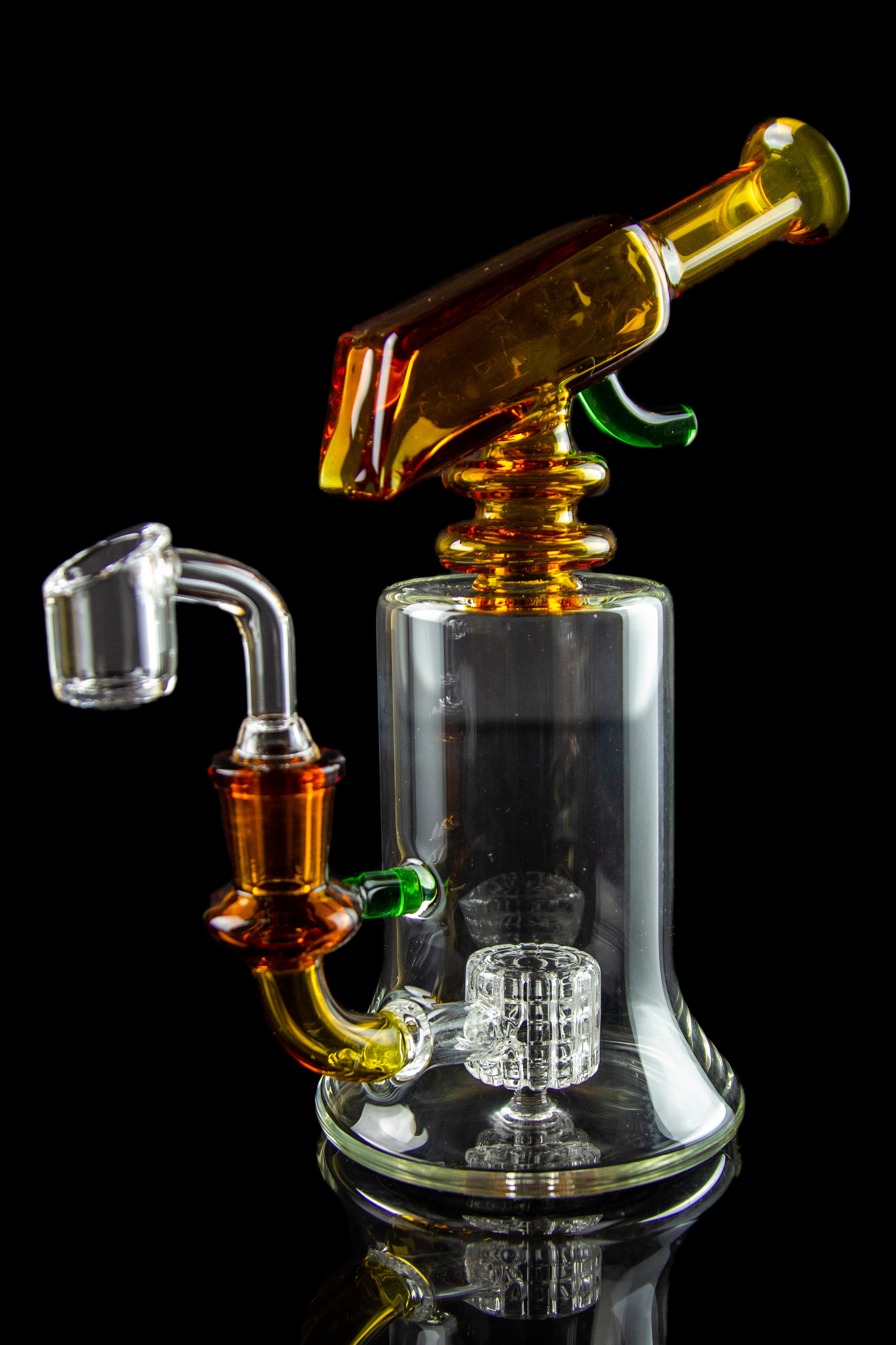 Glass water pipe (rig) with orange accents and bubbler, isolated on black.