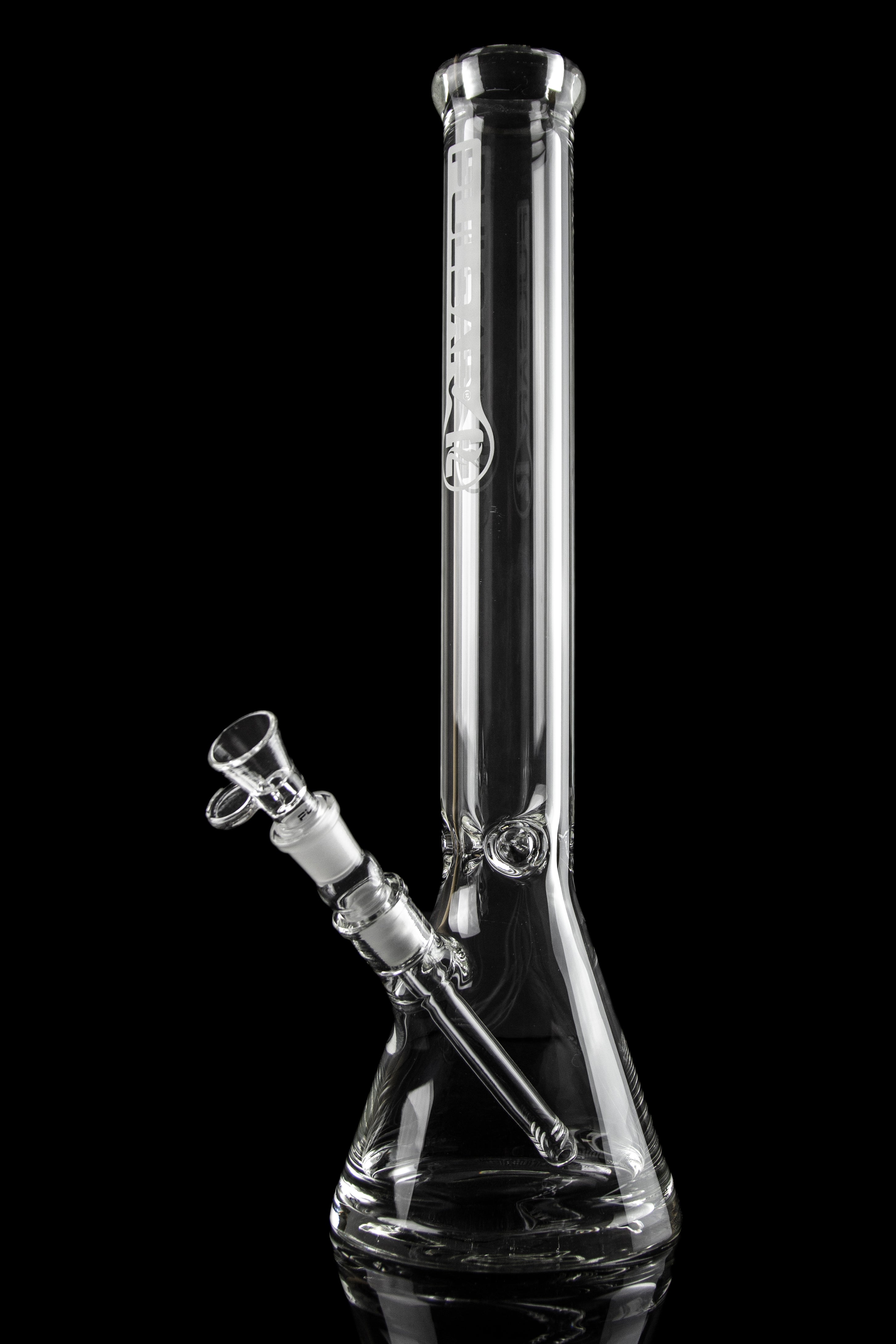 Clear glass bong with intricate design, isolated on black.