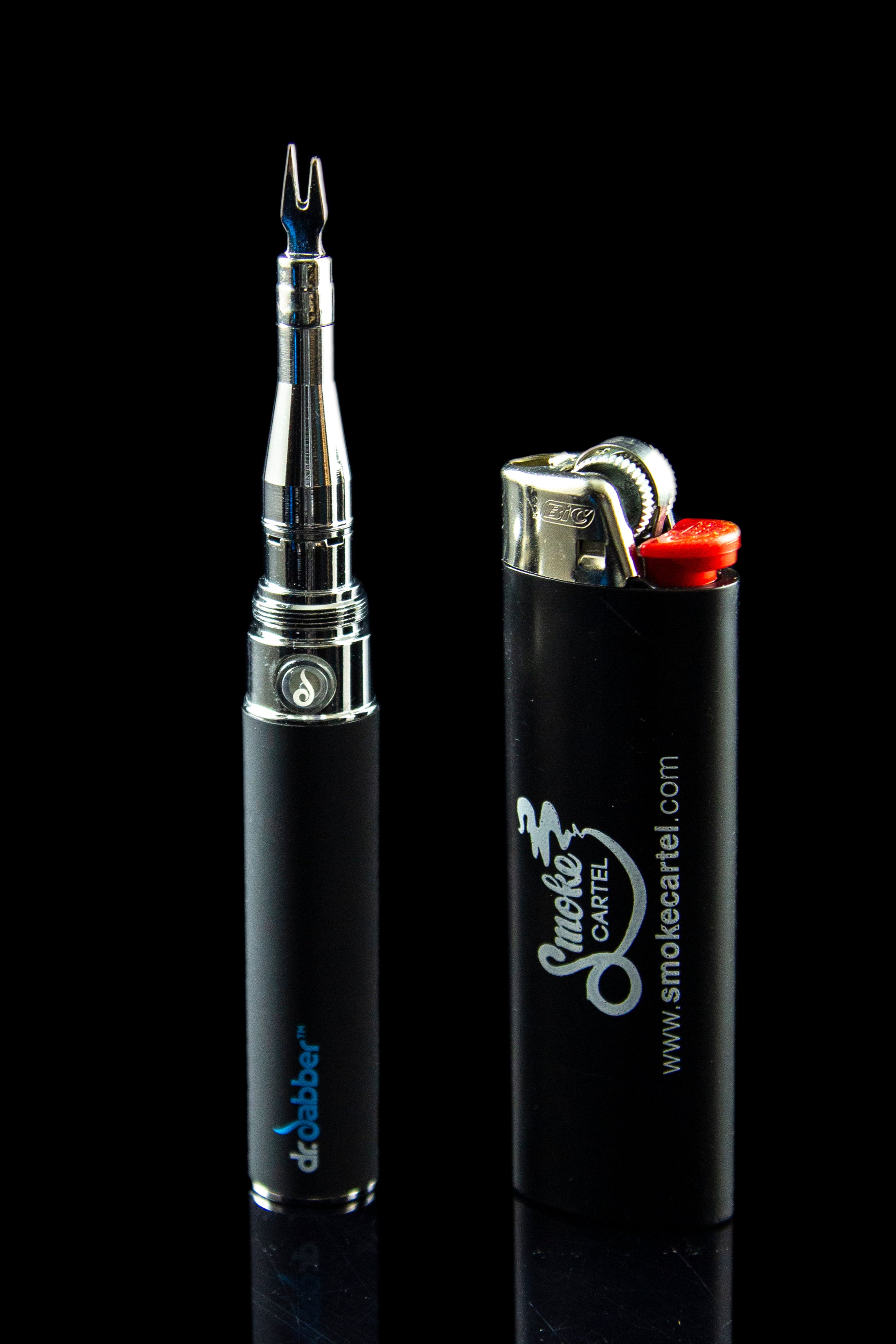 A close-up shot of the silver Dr. Dabber Budder Cutter against a dark background, highlighting its sleek, cylindrical form.