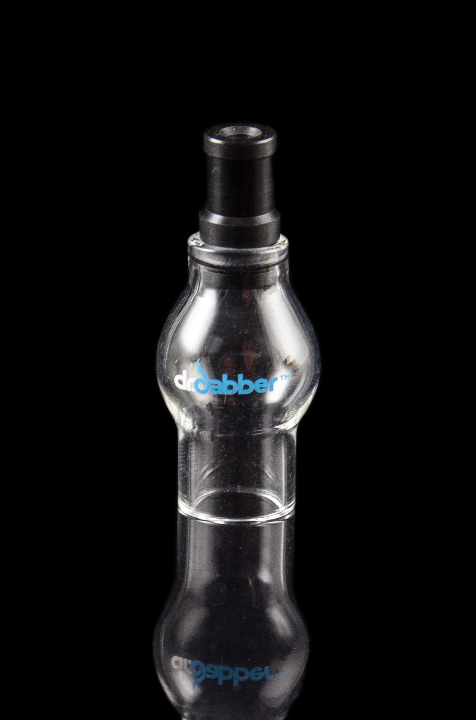 Clear glass dab rig with "dropper" logo and reflective surface.
