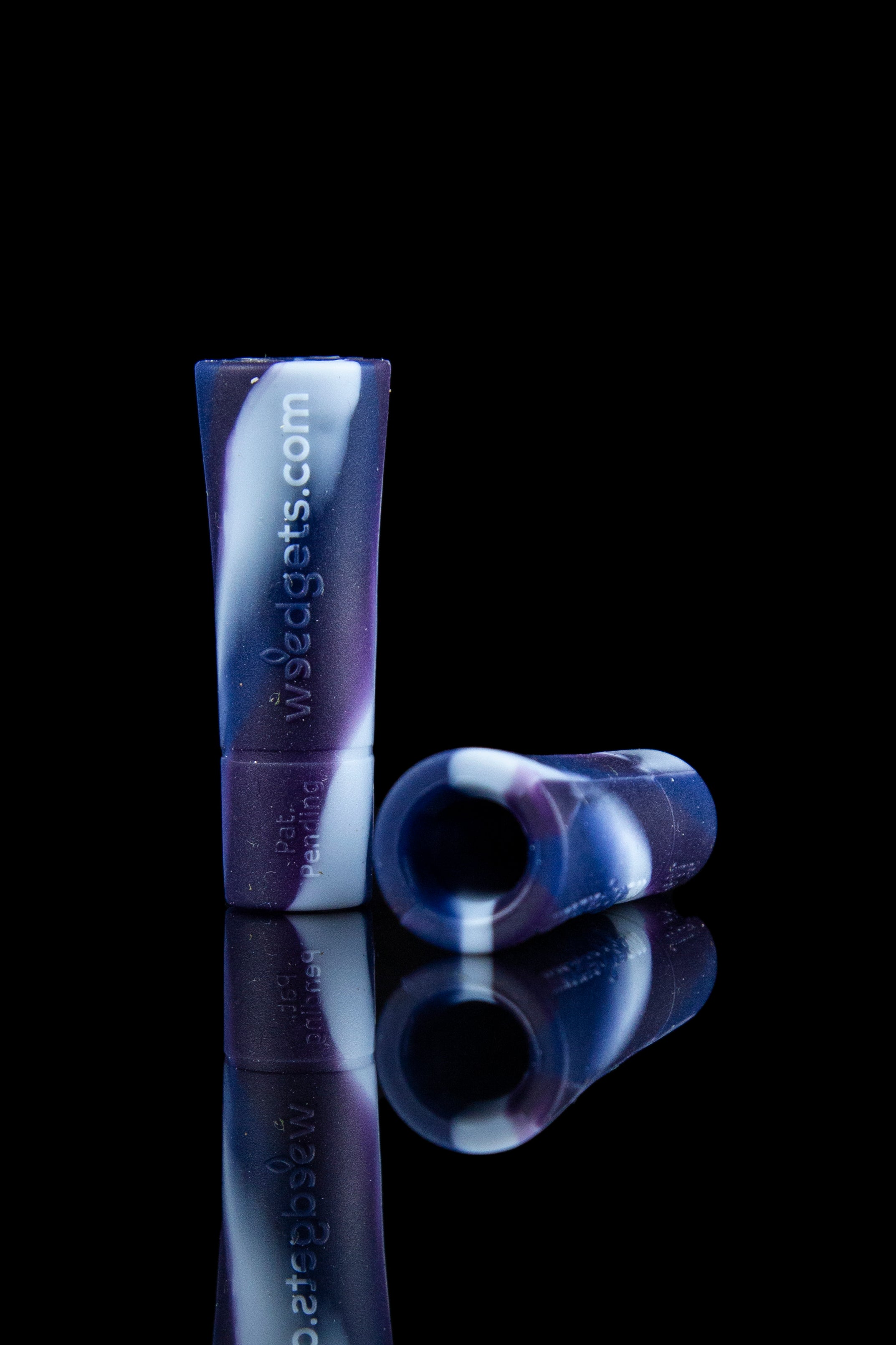 Purple and white glass pipe with a reflective surface.