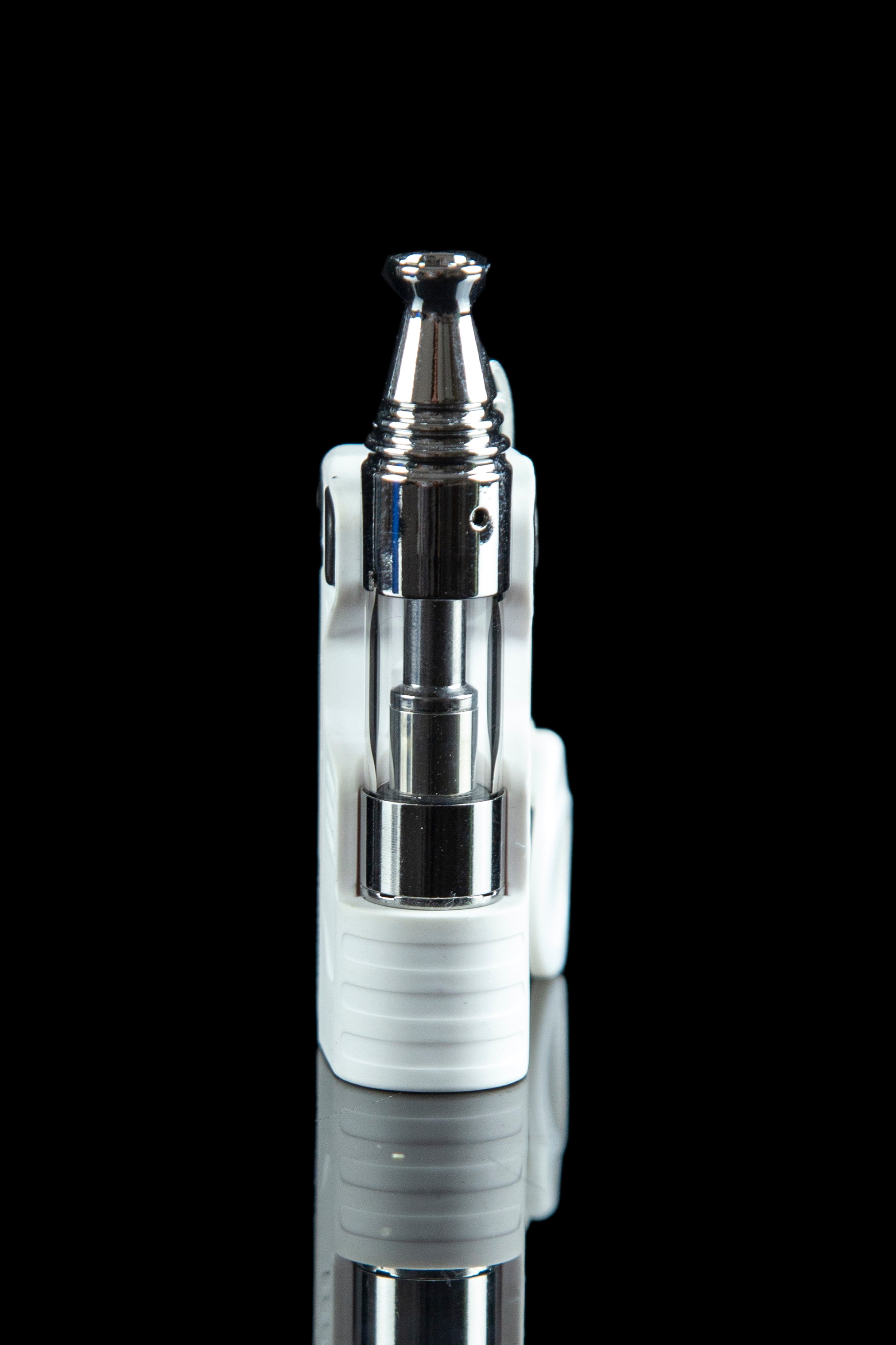 Silver and white cannabis oil vaporizer pen with clear tank, isolated on black.