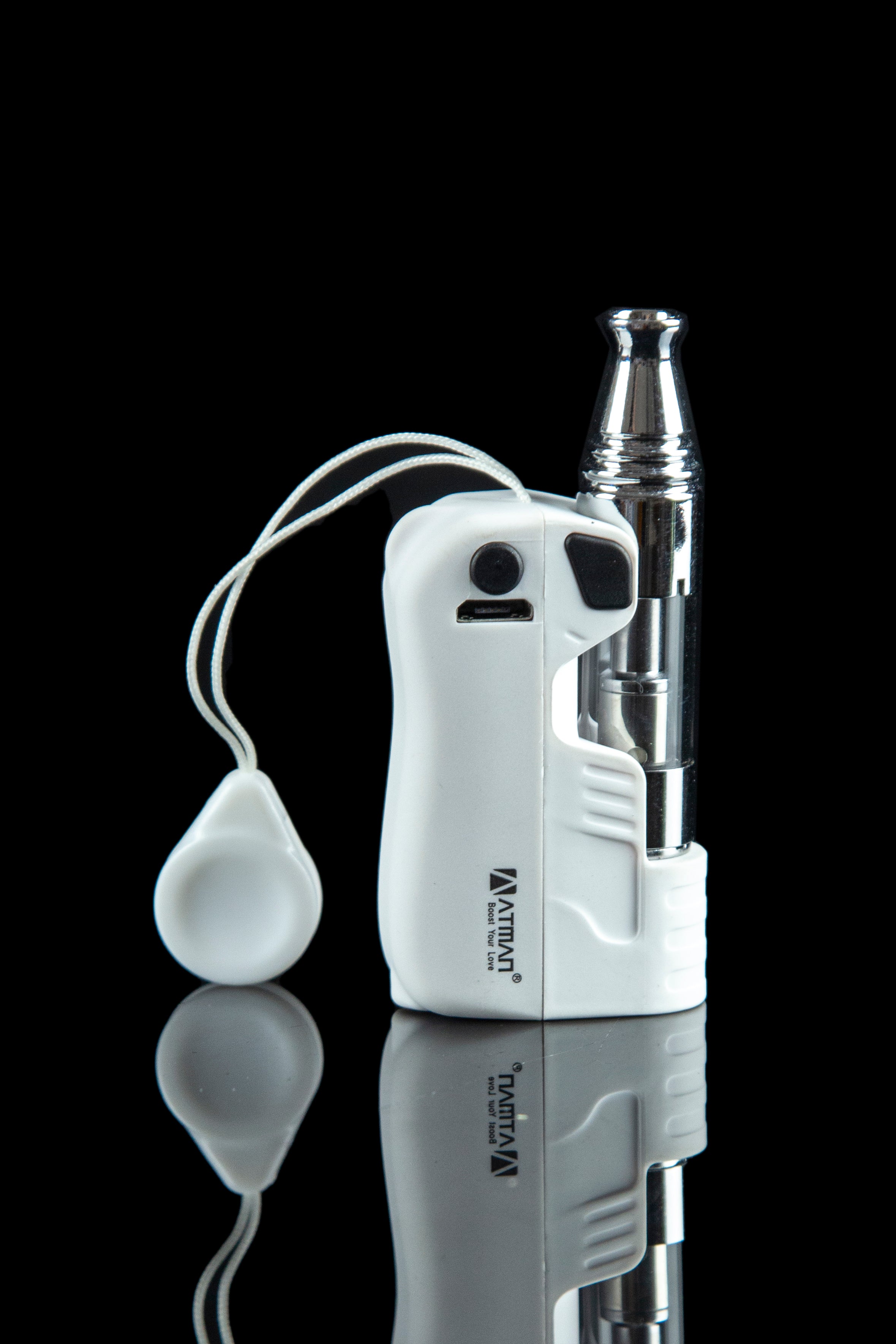 White electronic dab rig with glass mouthpiece and lanyard, reflected on a glossy black surface.