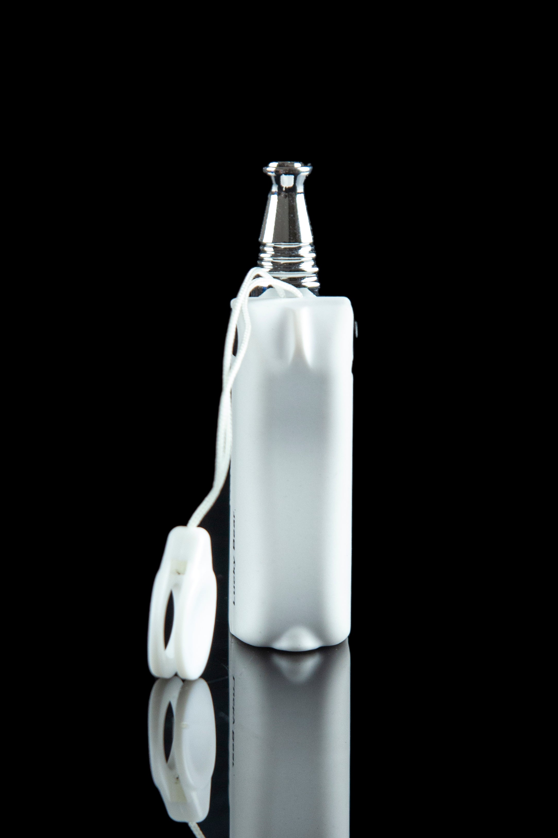 White silicone sleeve protecting a glass pipe, reflecting on a black surface.