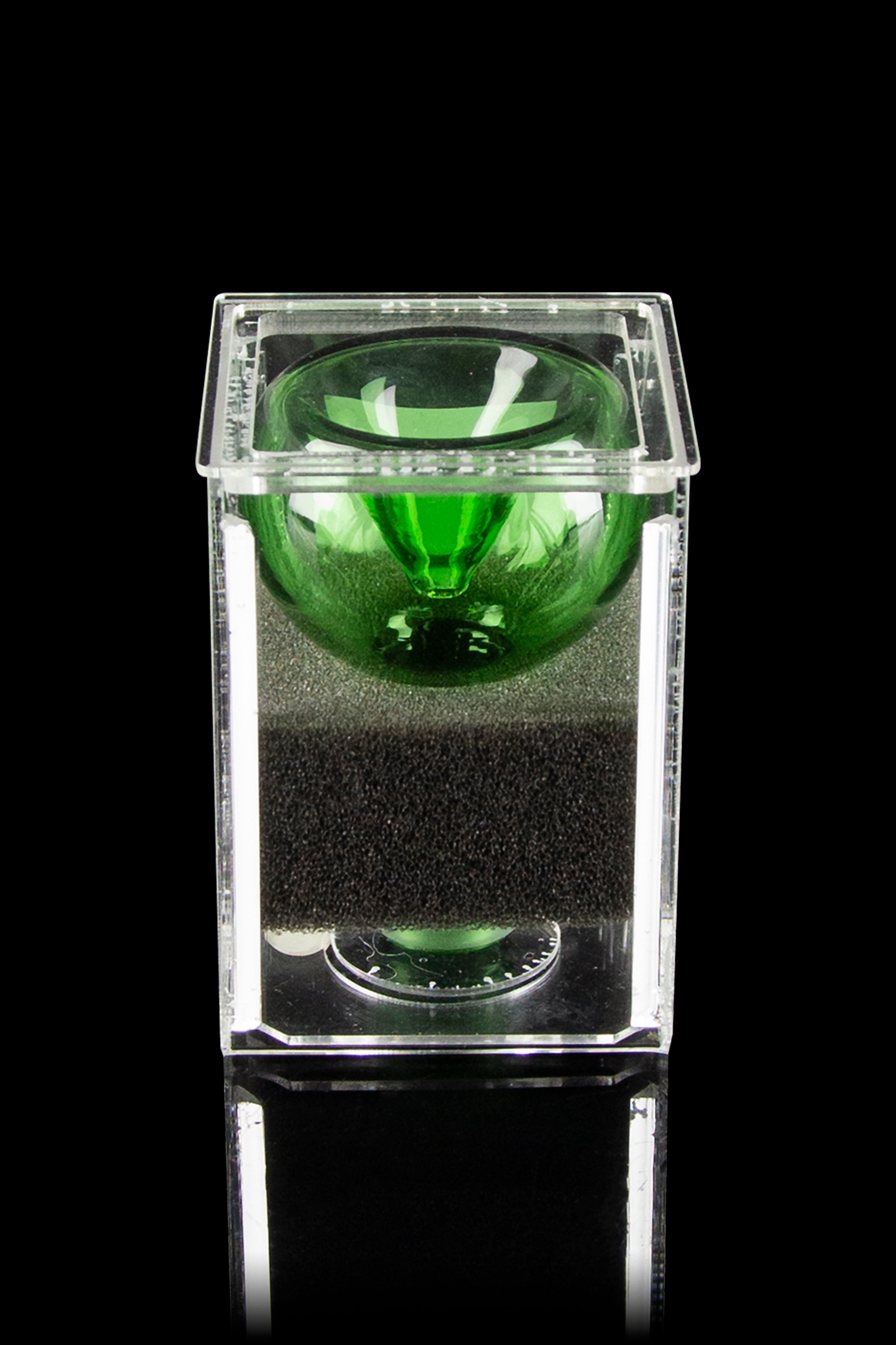 Green glass bubbler displayed in a clear acrylic case.