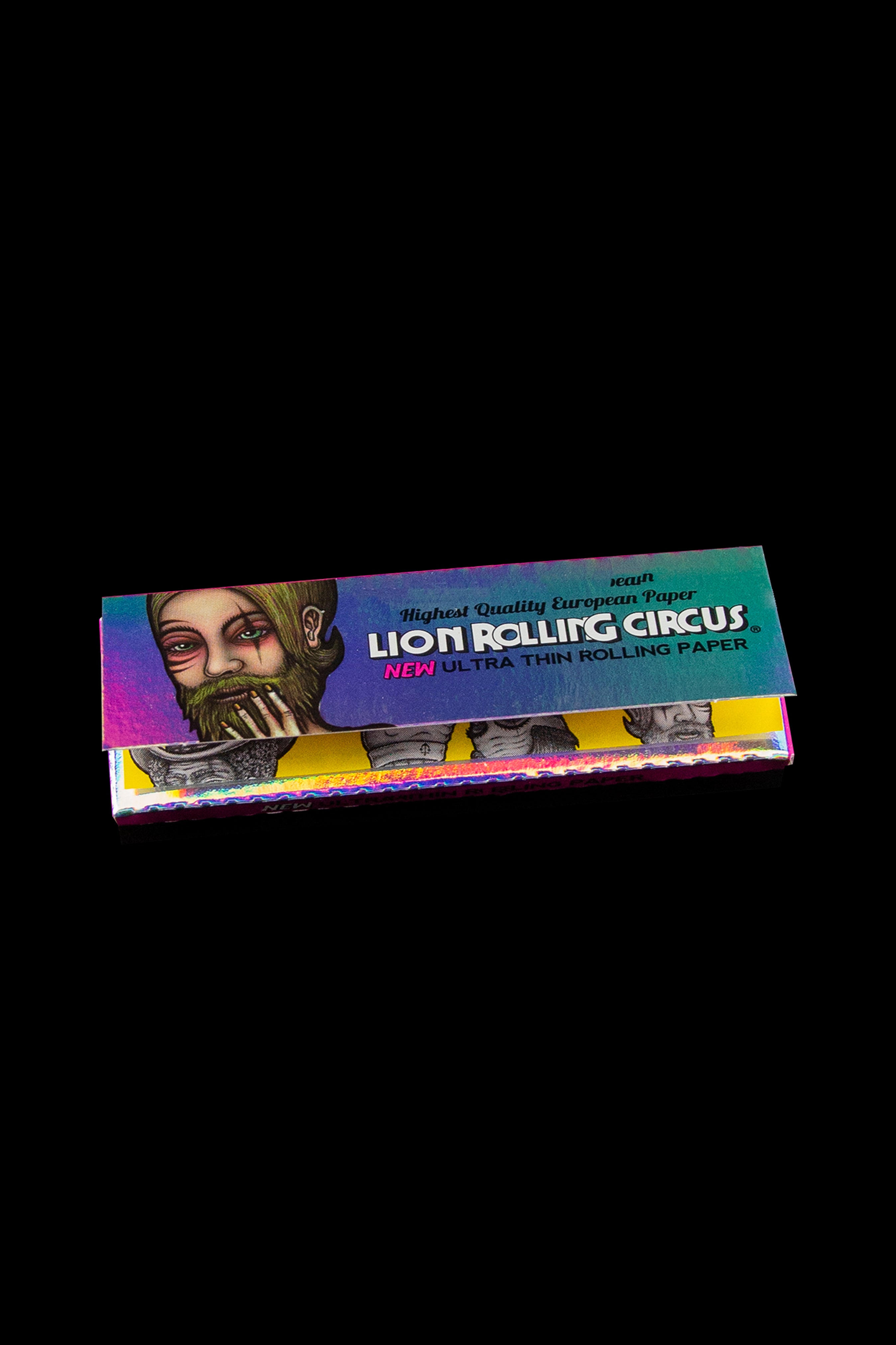 Package of Lion Rolling Circus ultra-thin rolling papers with a stylized portrait of a bearded man on a dark background.