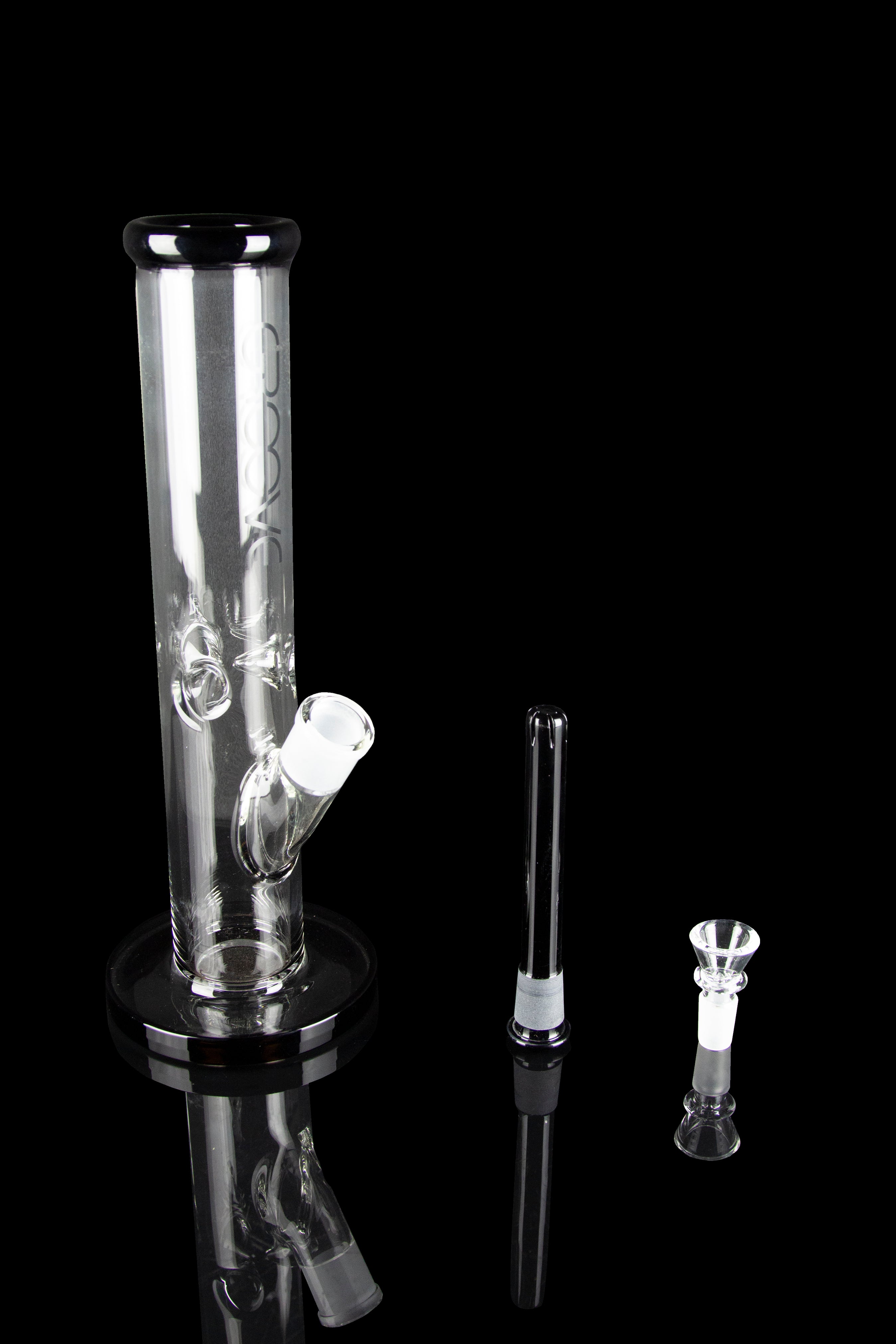Glass bong with diffuser downstem and bowl, studio shot on black reflective surface.
