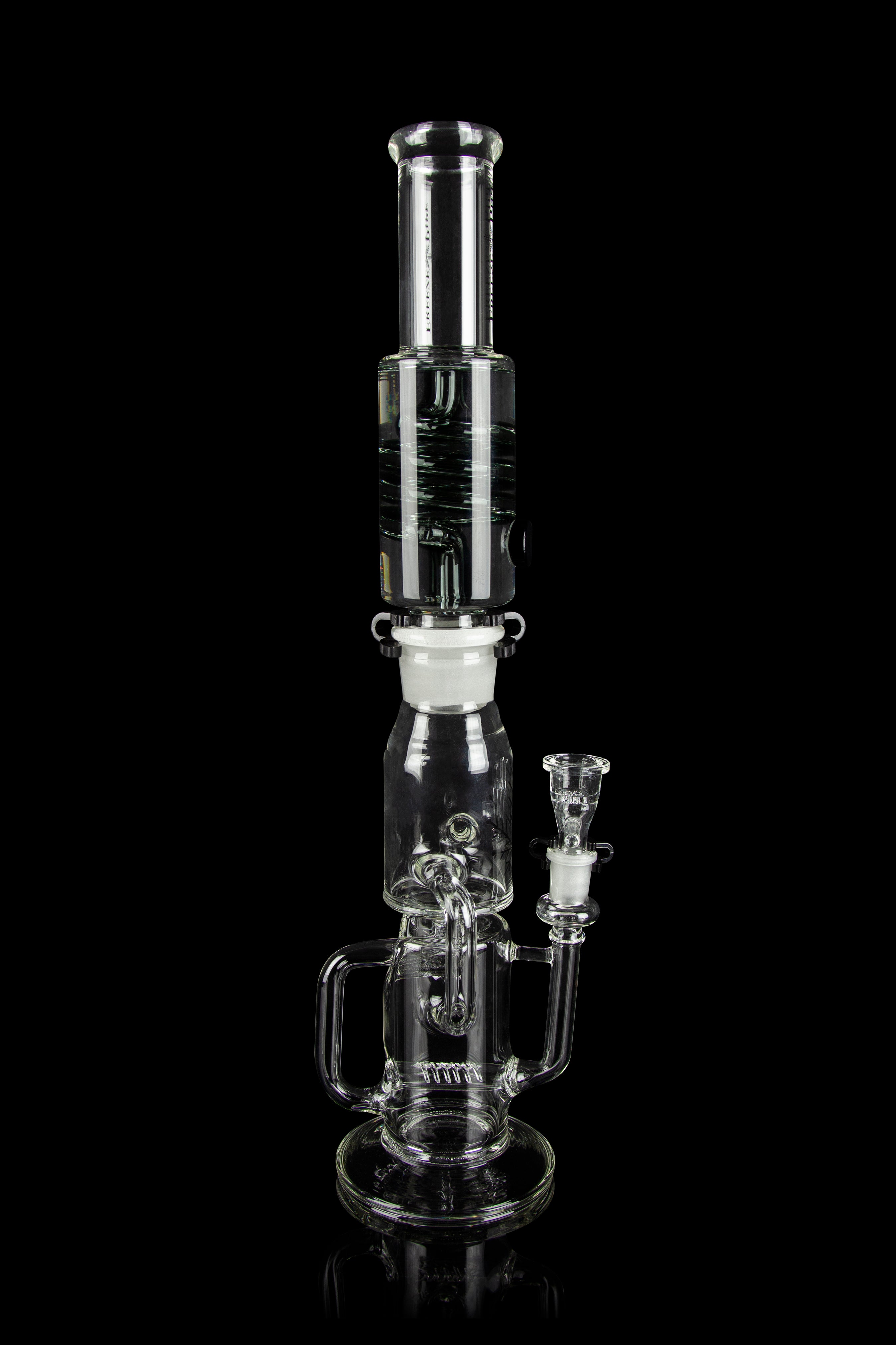 Clear glass water pipe (bong) with intricate branching percolators, against a black background.