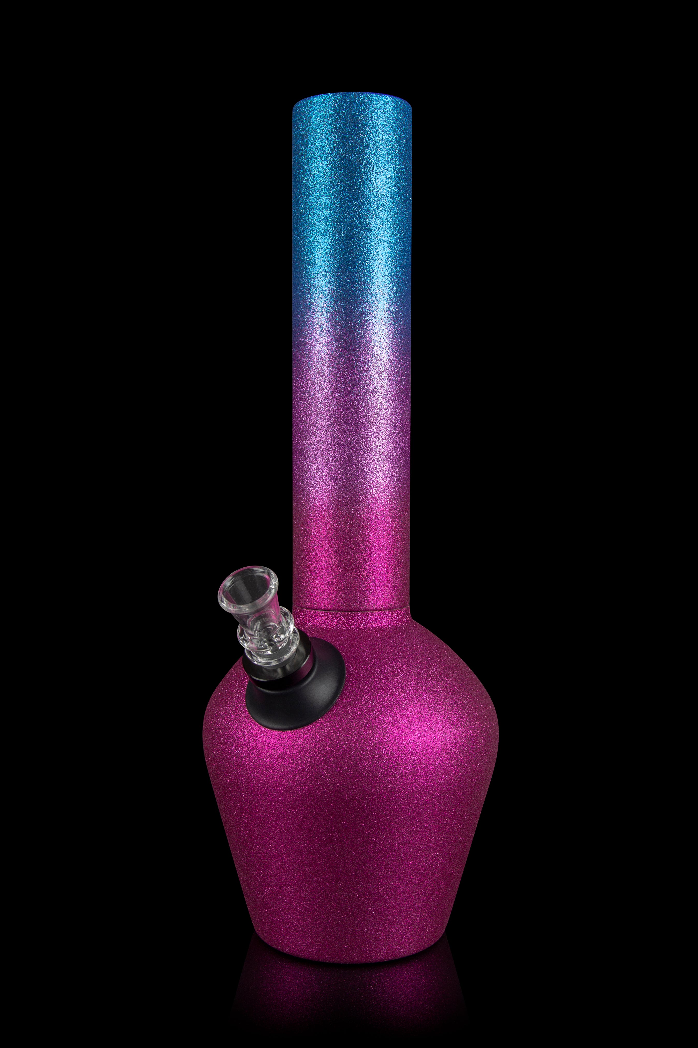 Glittery pink and blue glass water pipe (bong) against a black background.