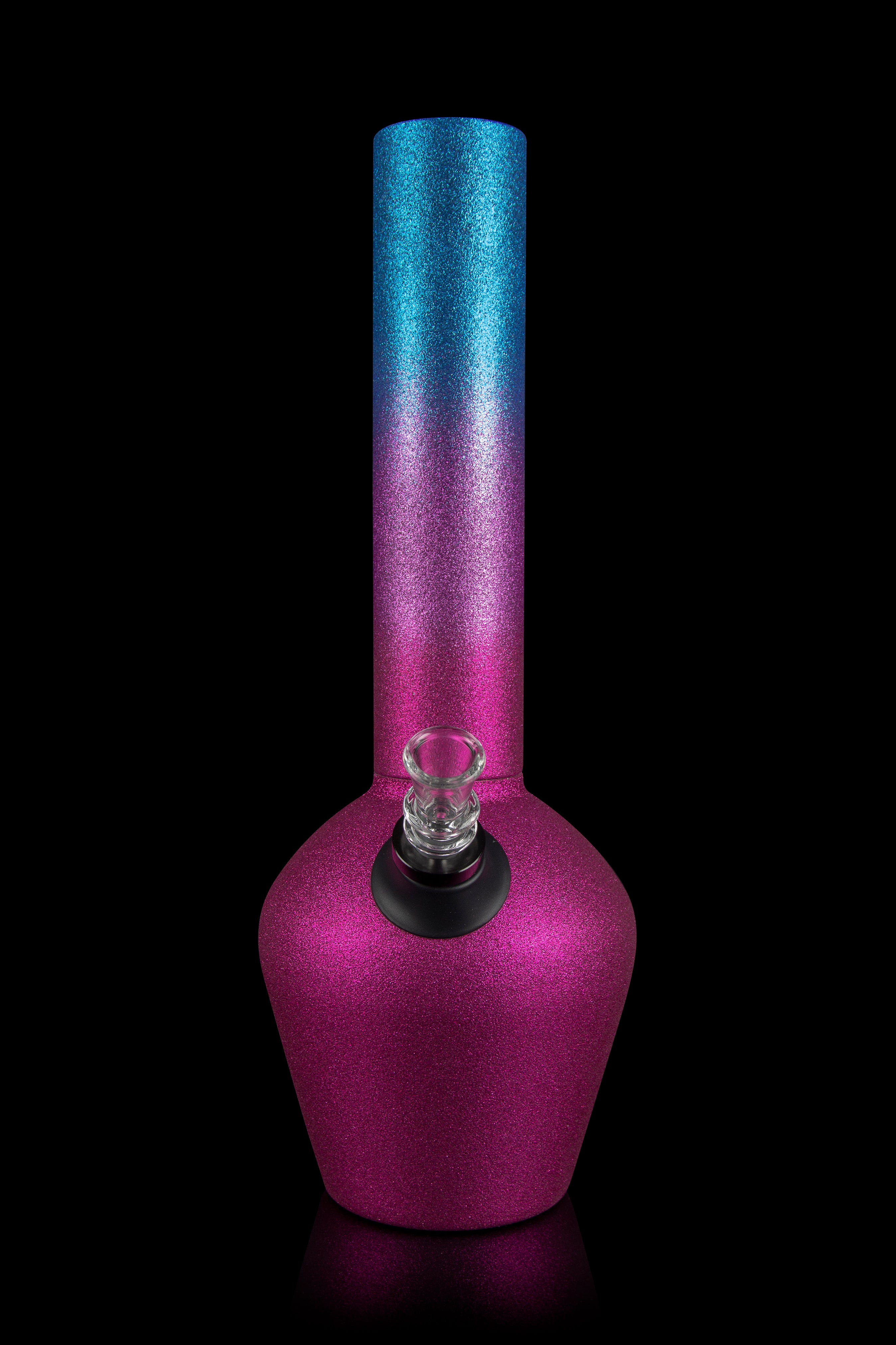 A vibrant pink and blue glass water pipe (bong) with a clear glass bowl, isolated on a black background.