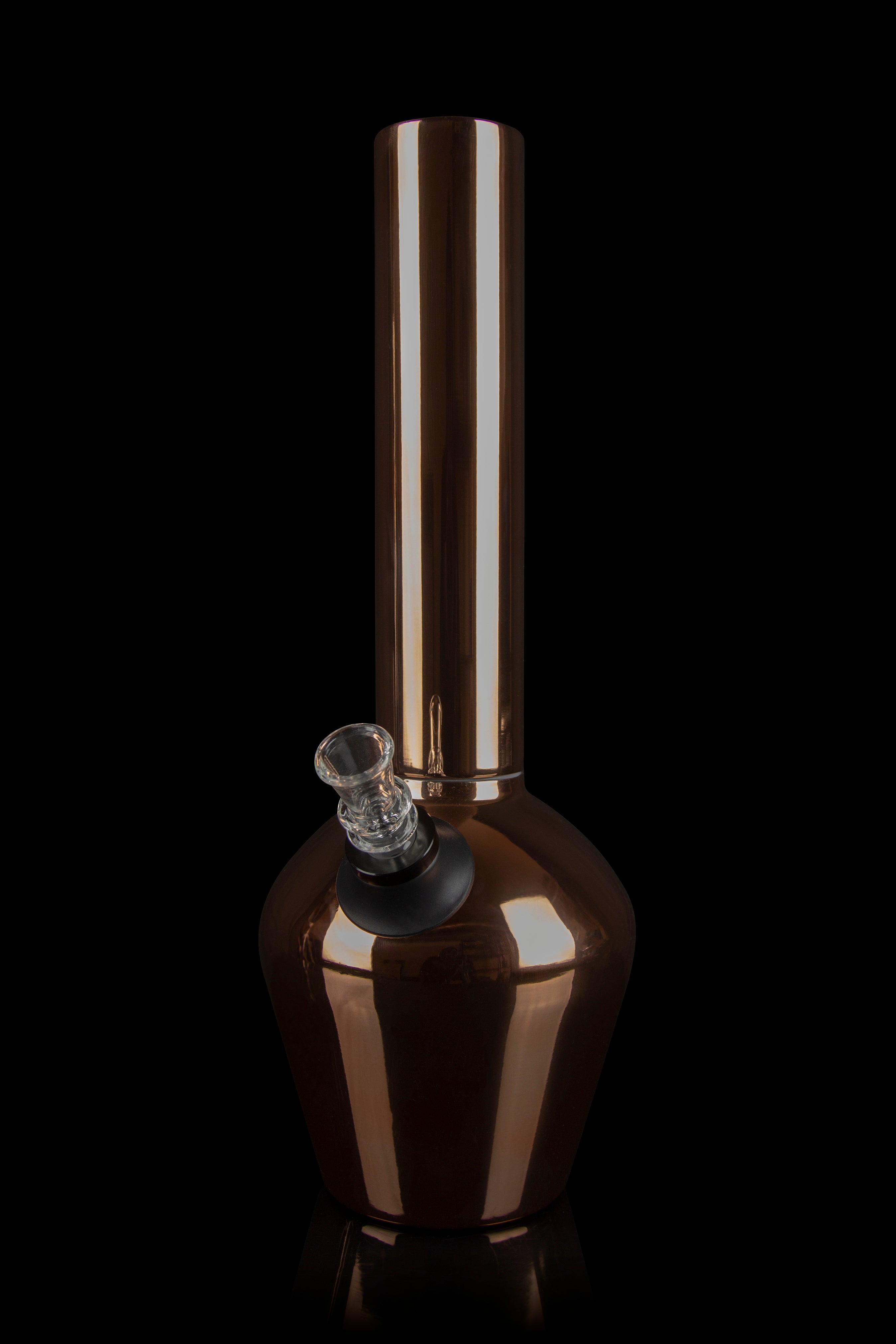Amber glass water pipe (bong) against a black background.