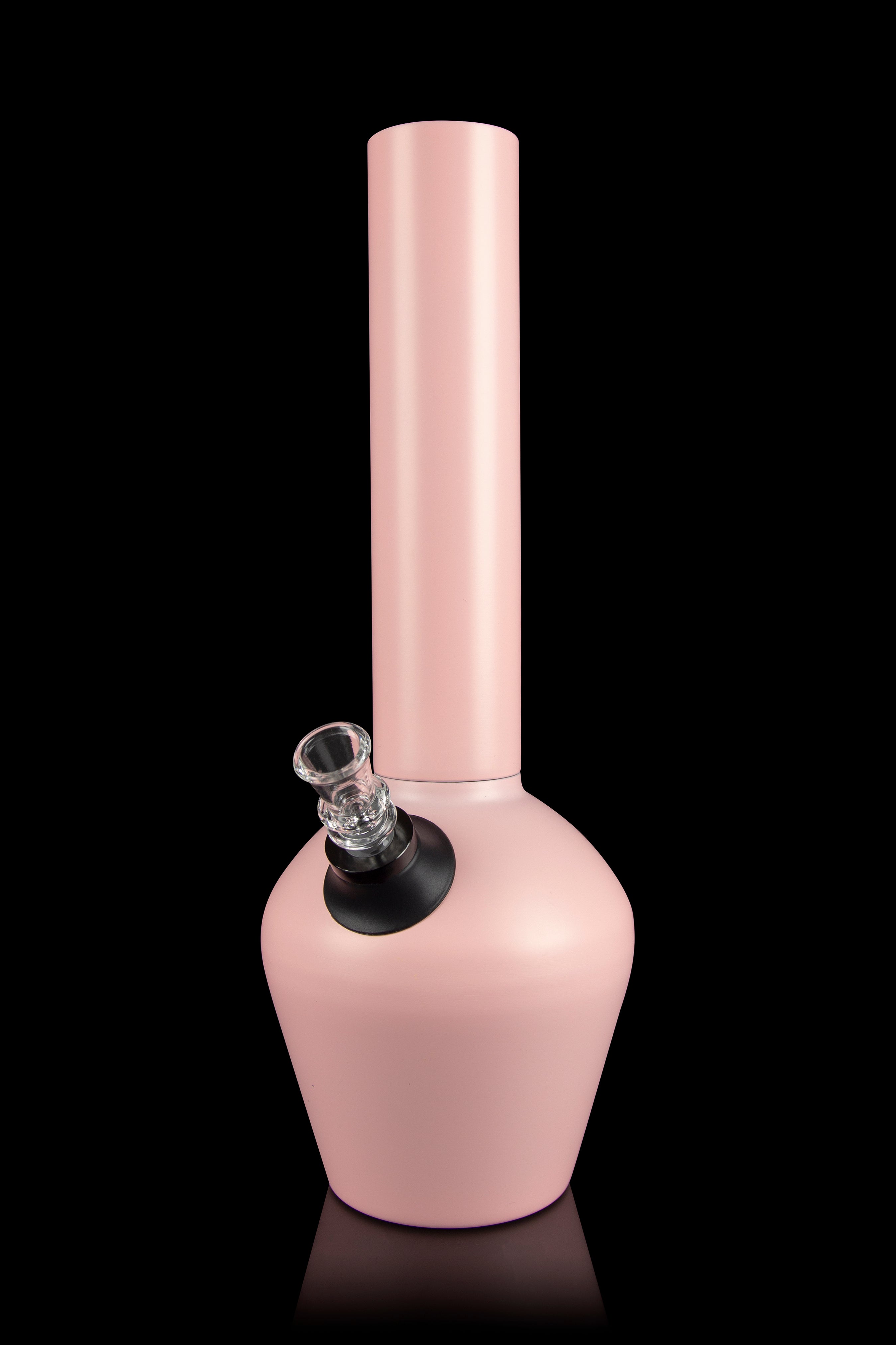 Pink glass water pipe with a clear glass bowl on a black reflective surface.