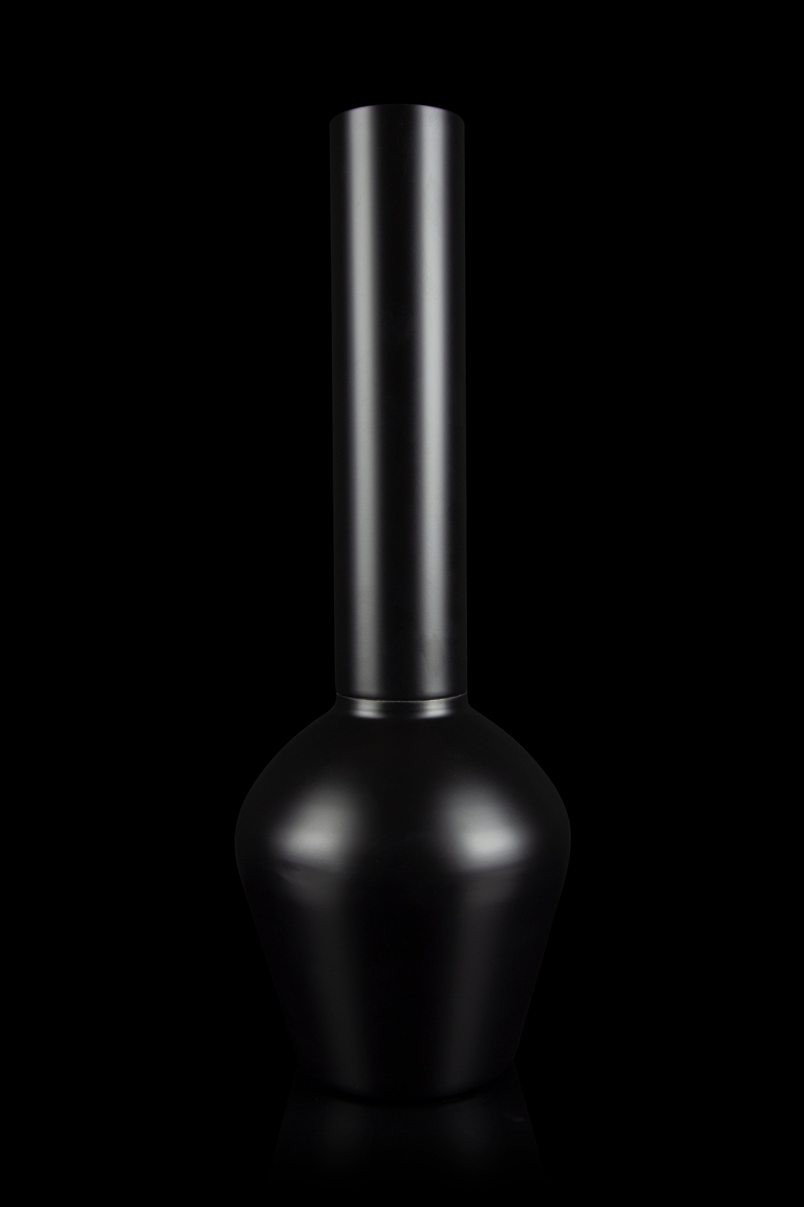 Sleek black glass water pipe (bong) with three visible tubes extending upwards.