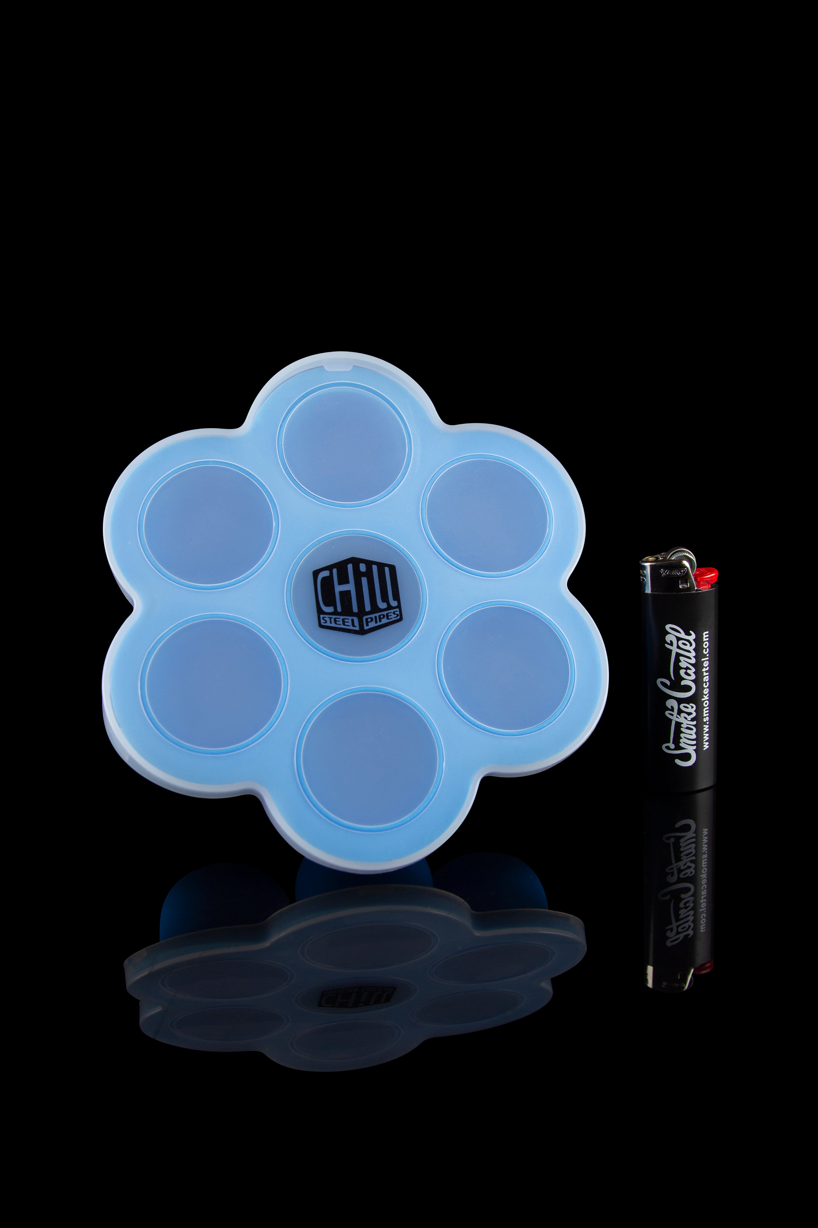 Front view of the Chill Steel Pipes Ice Cube Tray - 2 Pack, showing a blue silicone mold with circular indentations on a white surface.