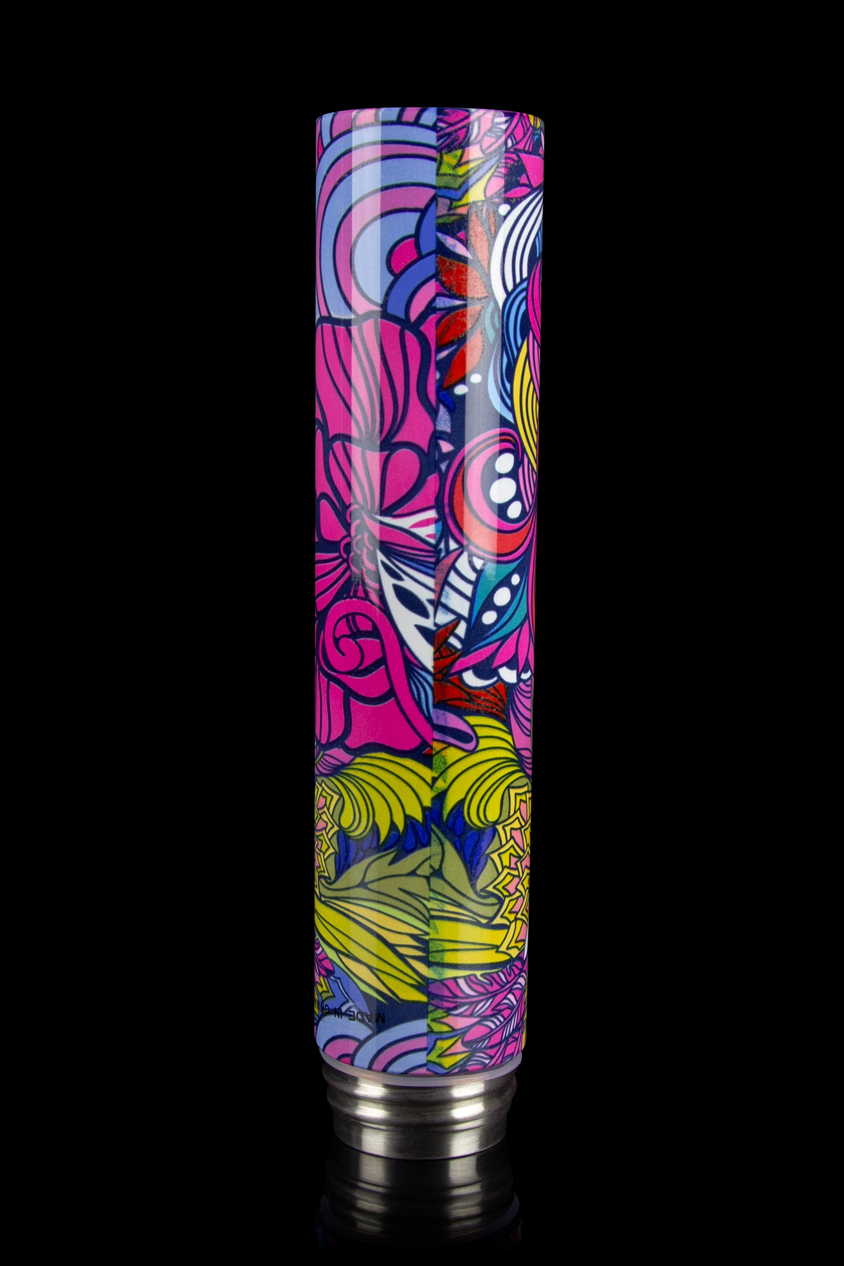 Vibrant psychedelic patterned cannabis grinder with silver base and teeth.