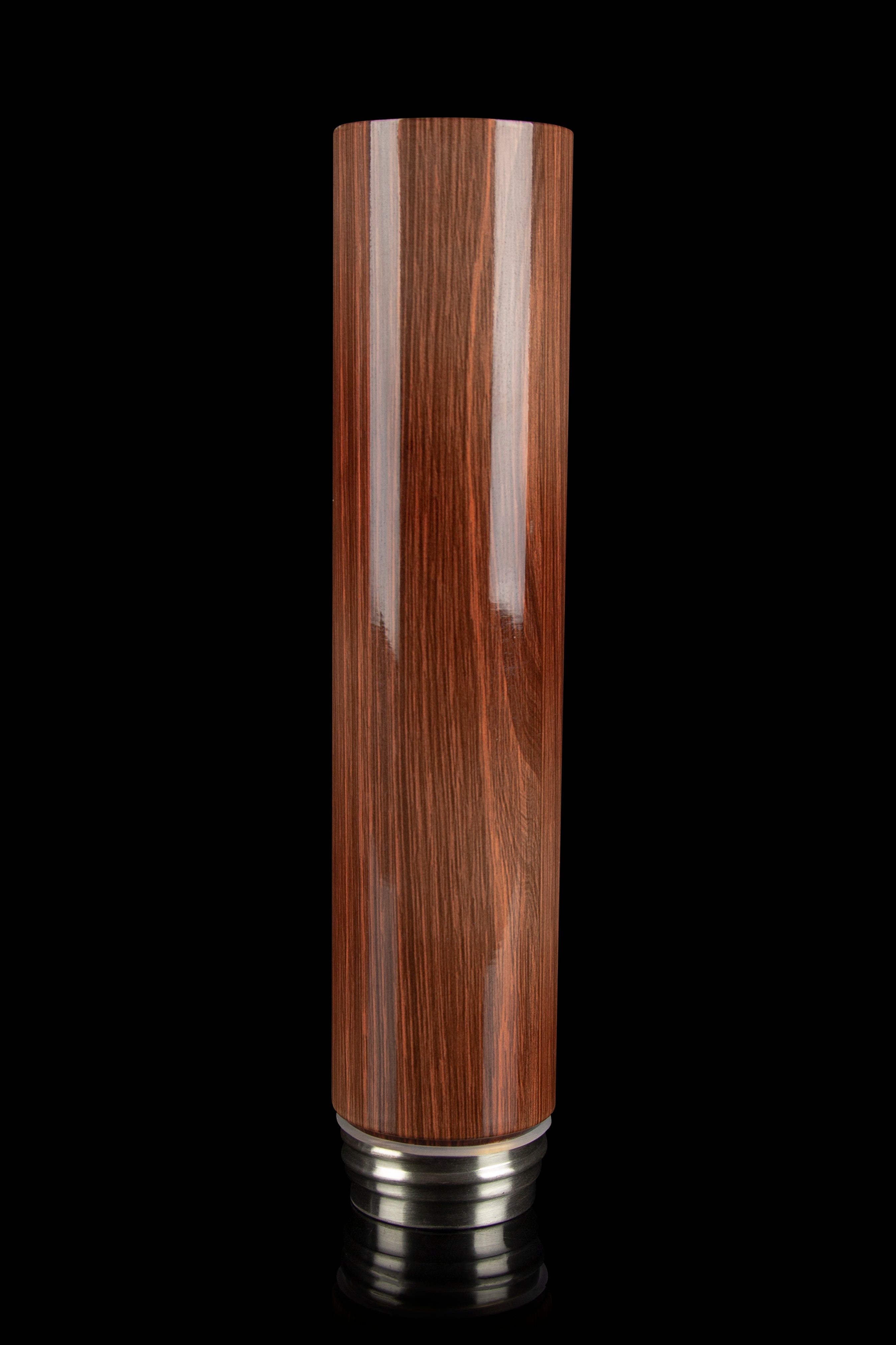 Wooden bubbler stem isolated on a black background.
