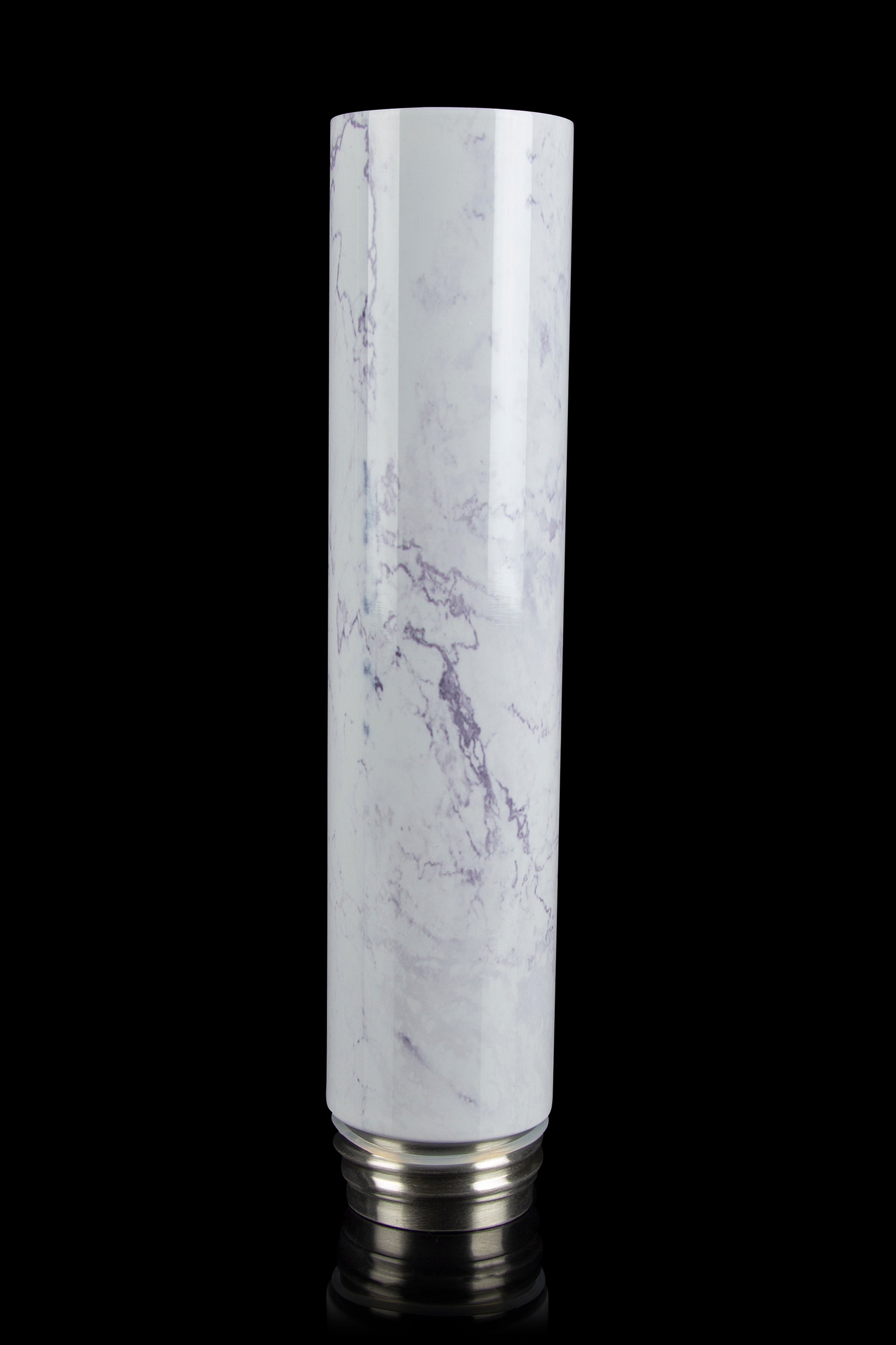 Marble-patterned glass bubbler with metallic base, isolated on black.