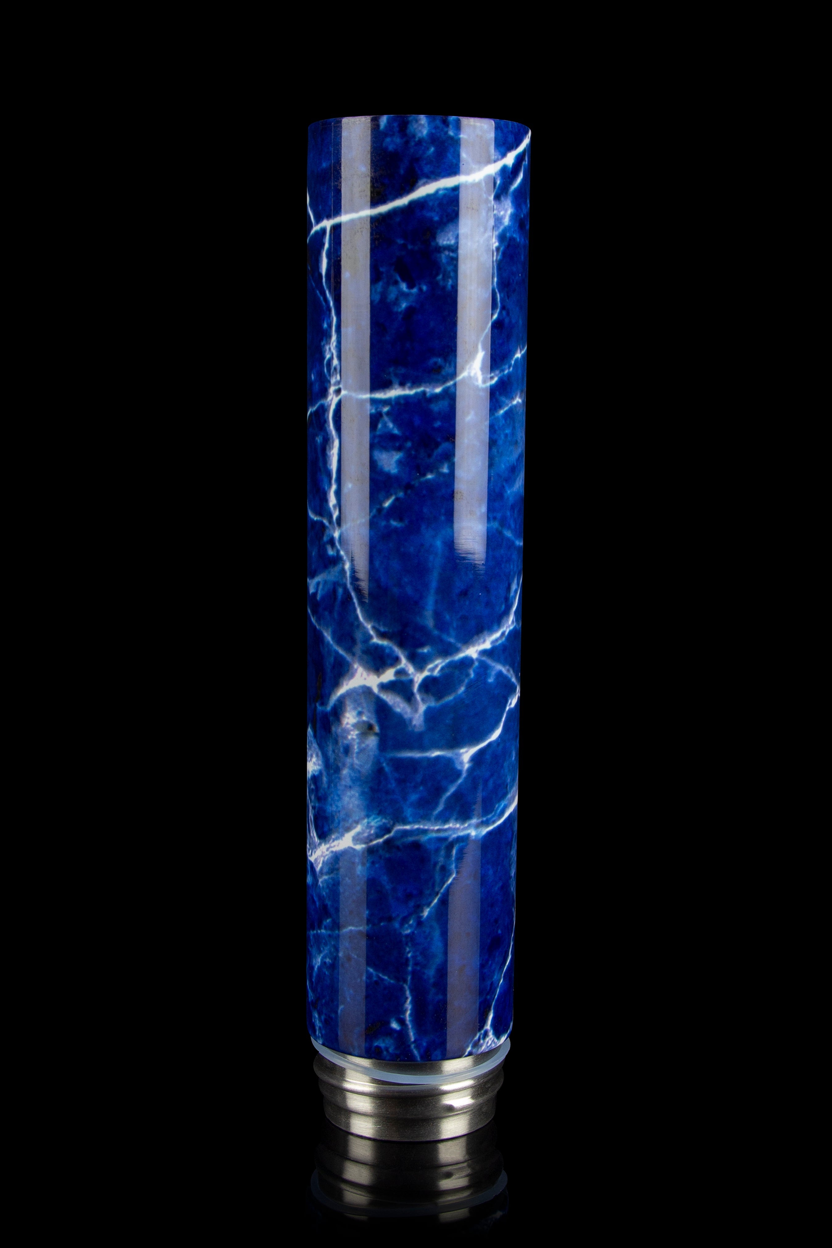 Blue marbled glass bong against a black background.