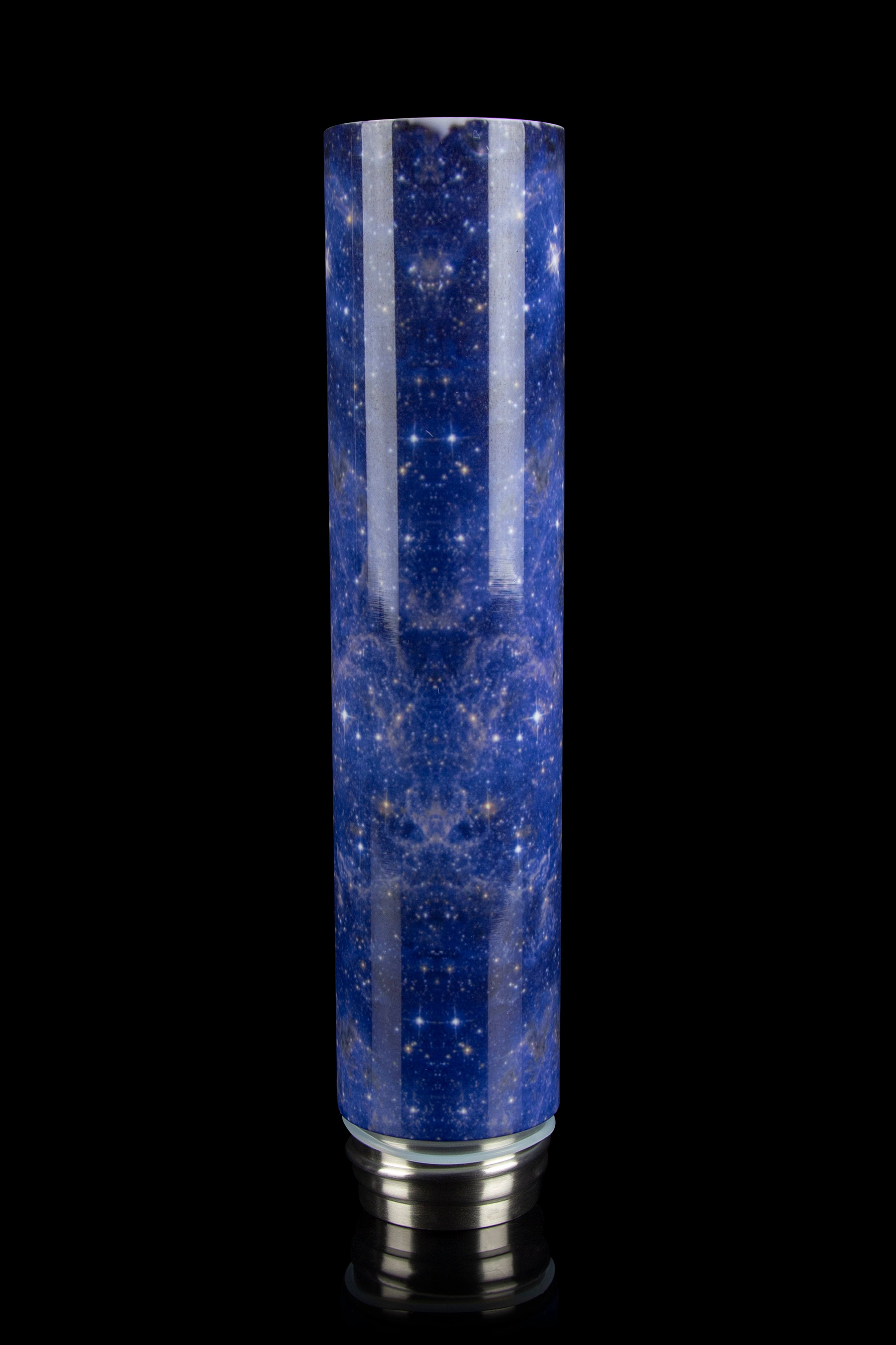 Tall cylindrical glass pipe with a deep blue, galaxy-inspired design and metallic base, isolated on a black background.