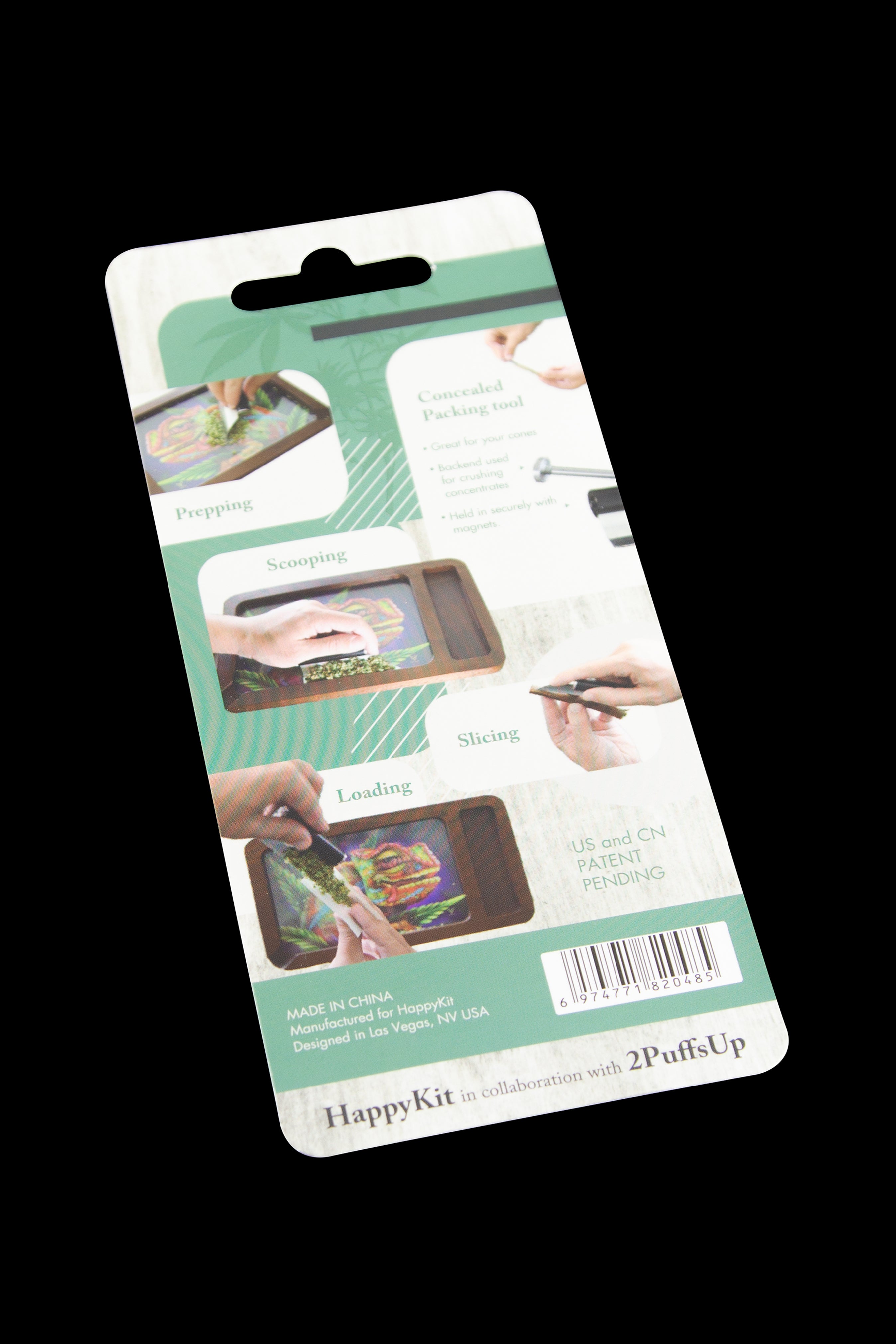 Close-up of packaging for a cannabis accessory kit, displaying instructions for prepping, scooping, slicing, and loading, branded "HappyKit" and "2PuffsUp".