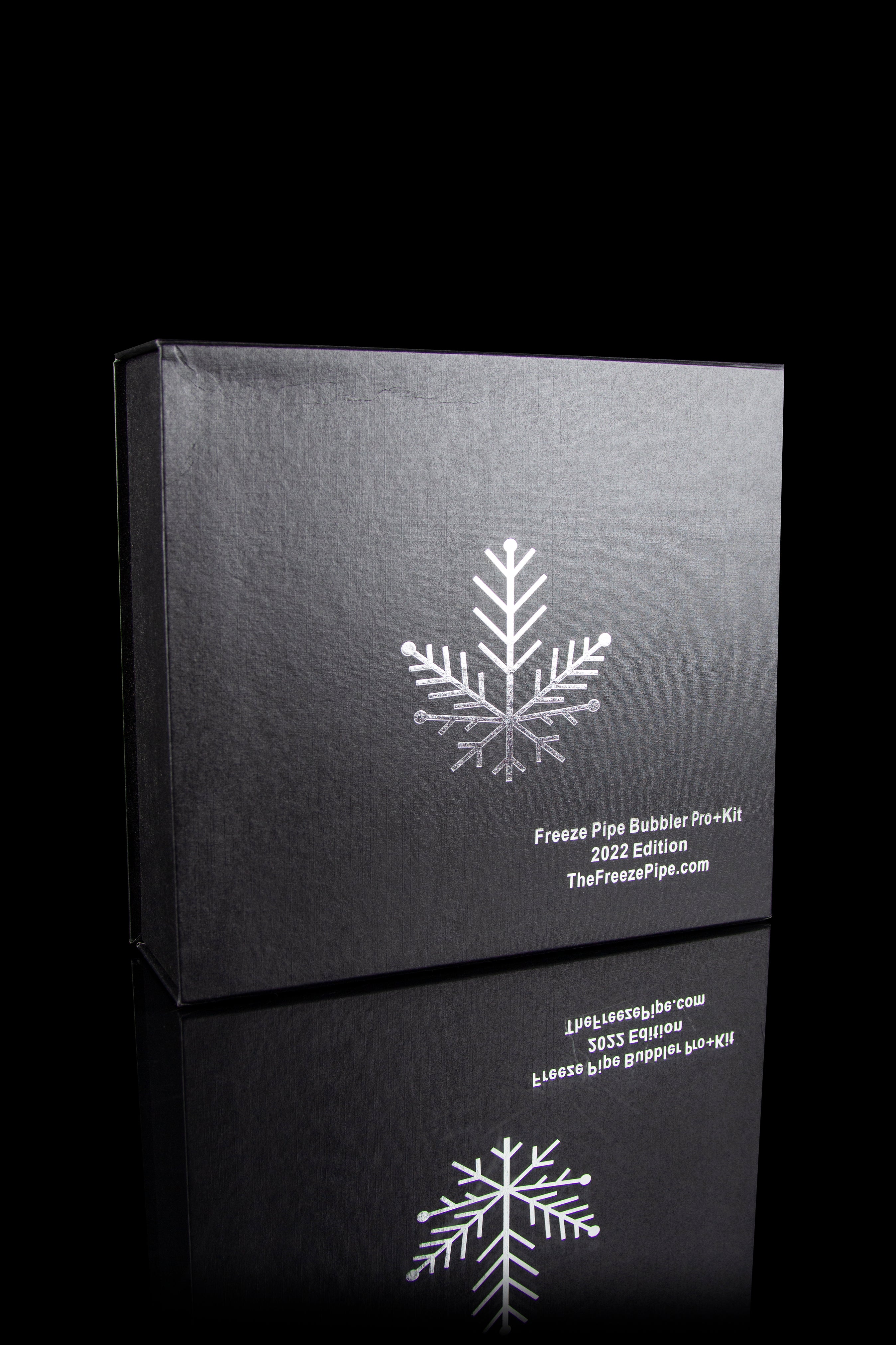 Black box for “Freeze Pipe Bubbler Pro+Kit” with snowflake design, promoting TheFreezePipe.com.