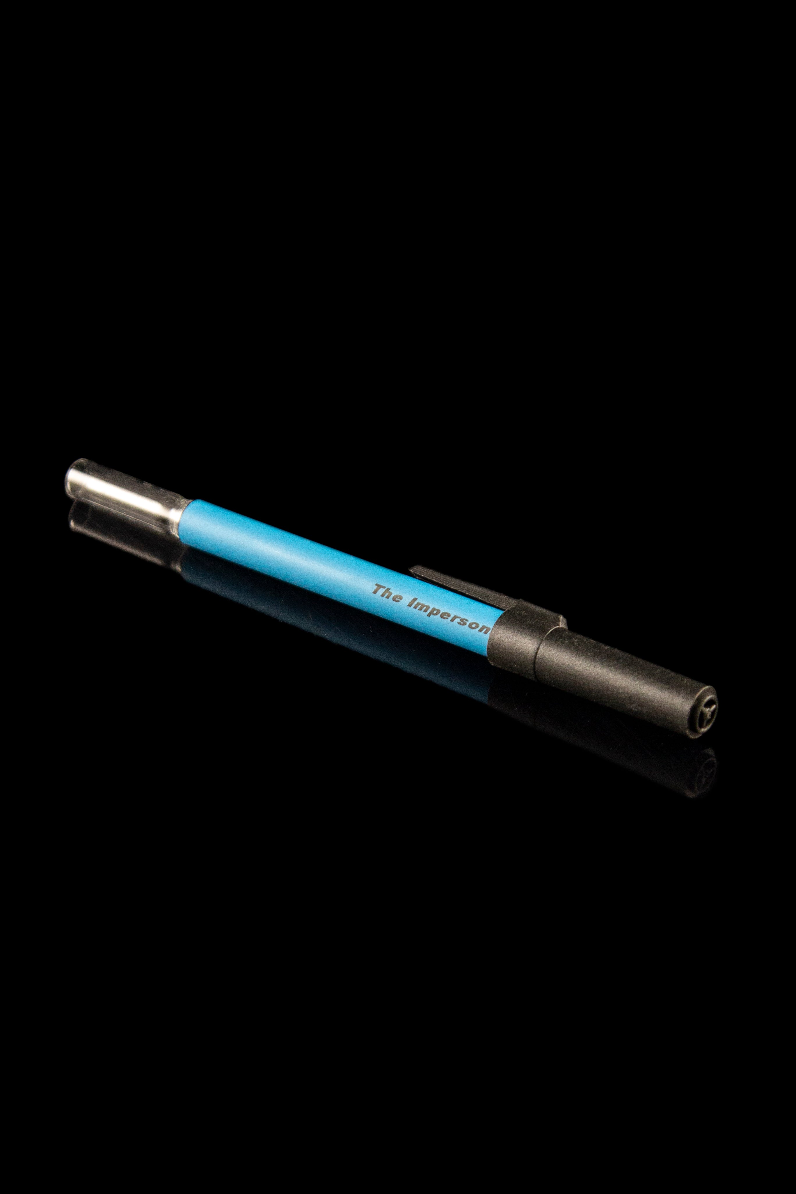 Blue and black cannabis dab pen against a black background.