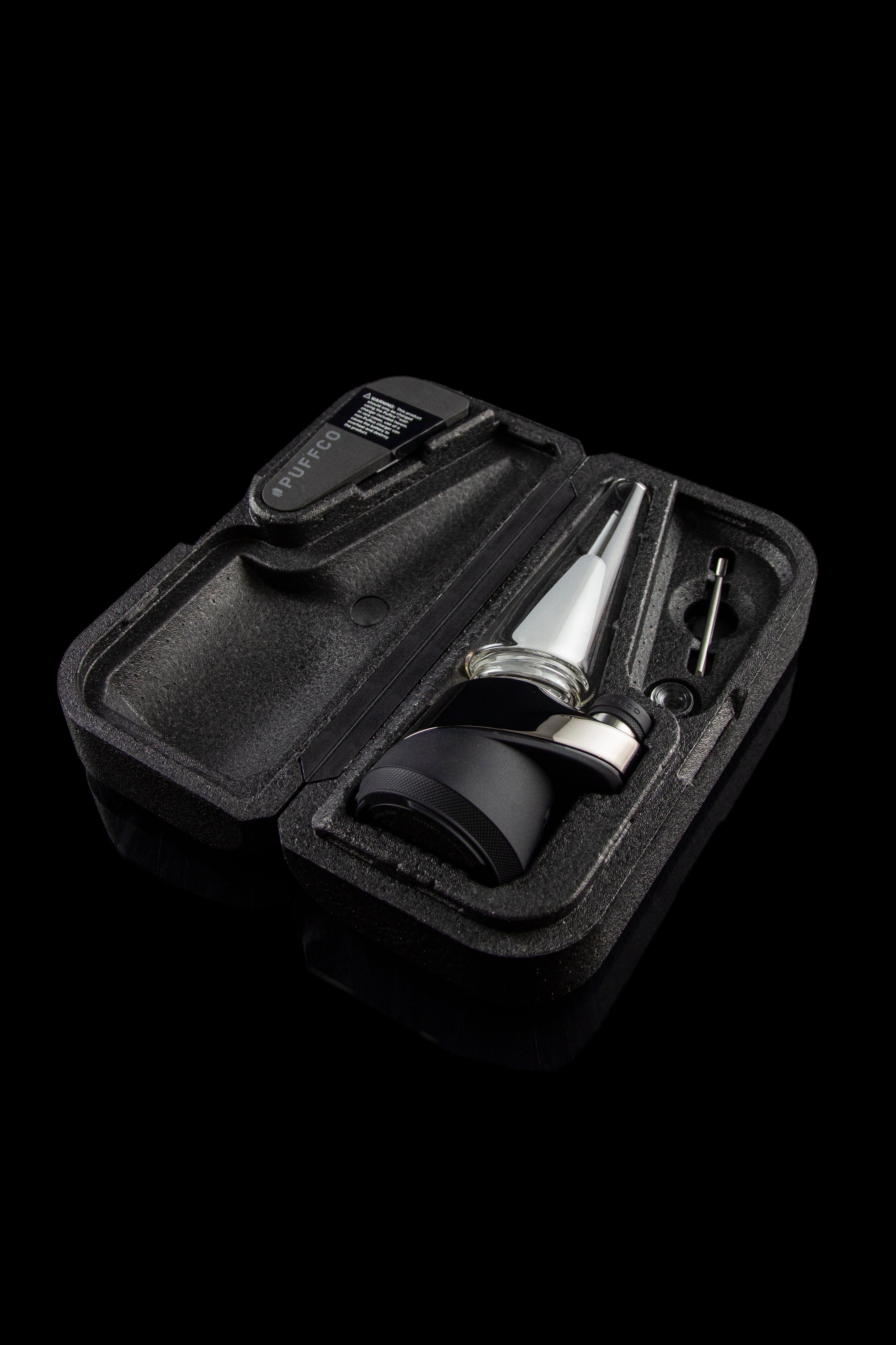 Puffco Peak portable dab rig kit in a protective black case.