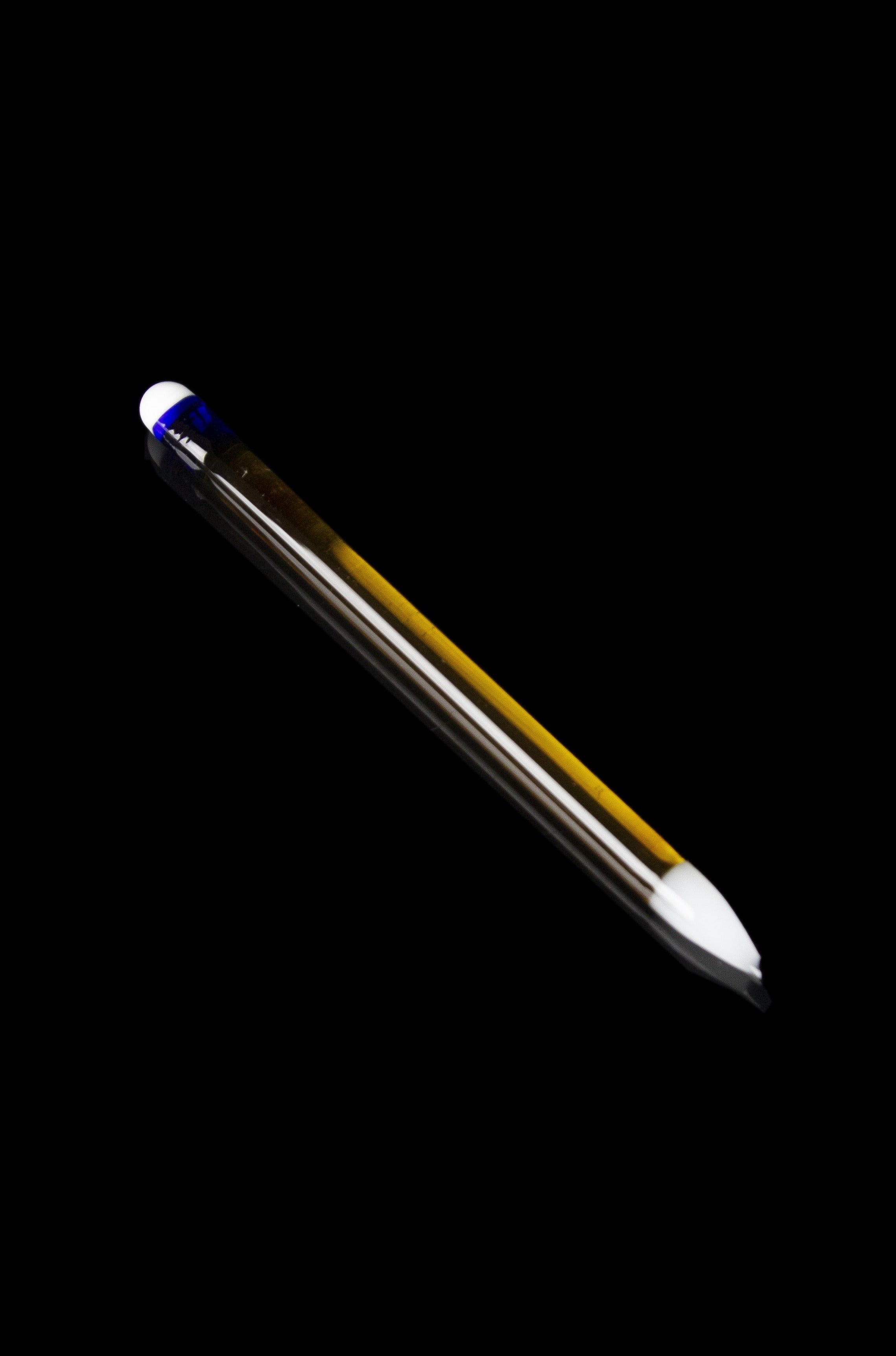 Glass oil burner pipe with blue accents against a black background.