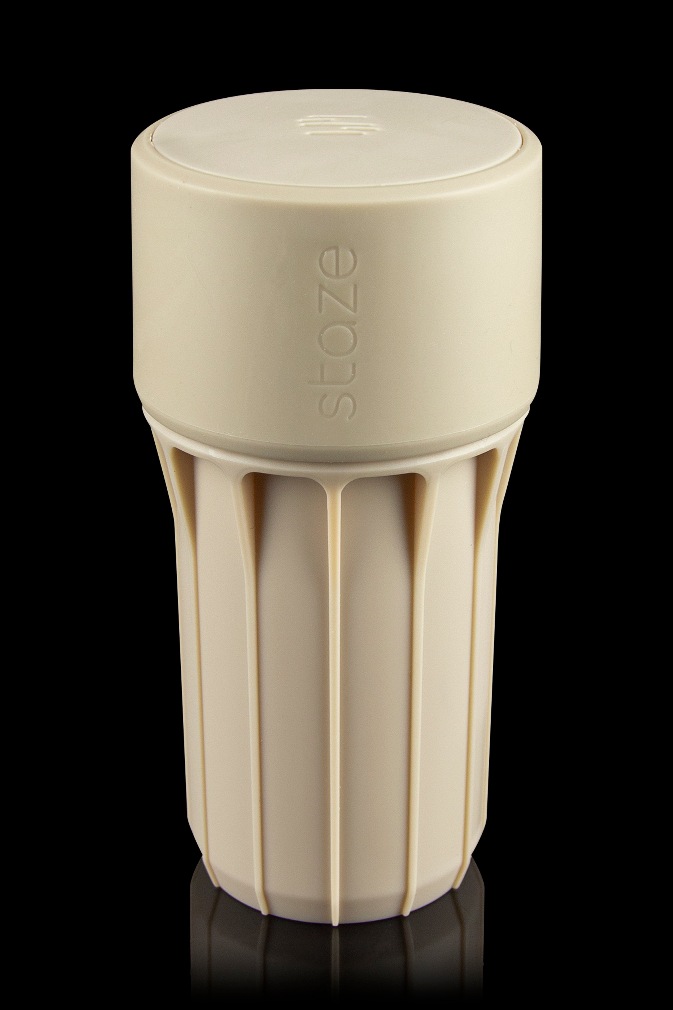 Beige Stoze cannabis container with a textured, ribbed body and airtight lid.