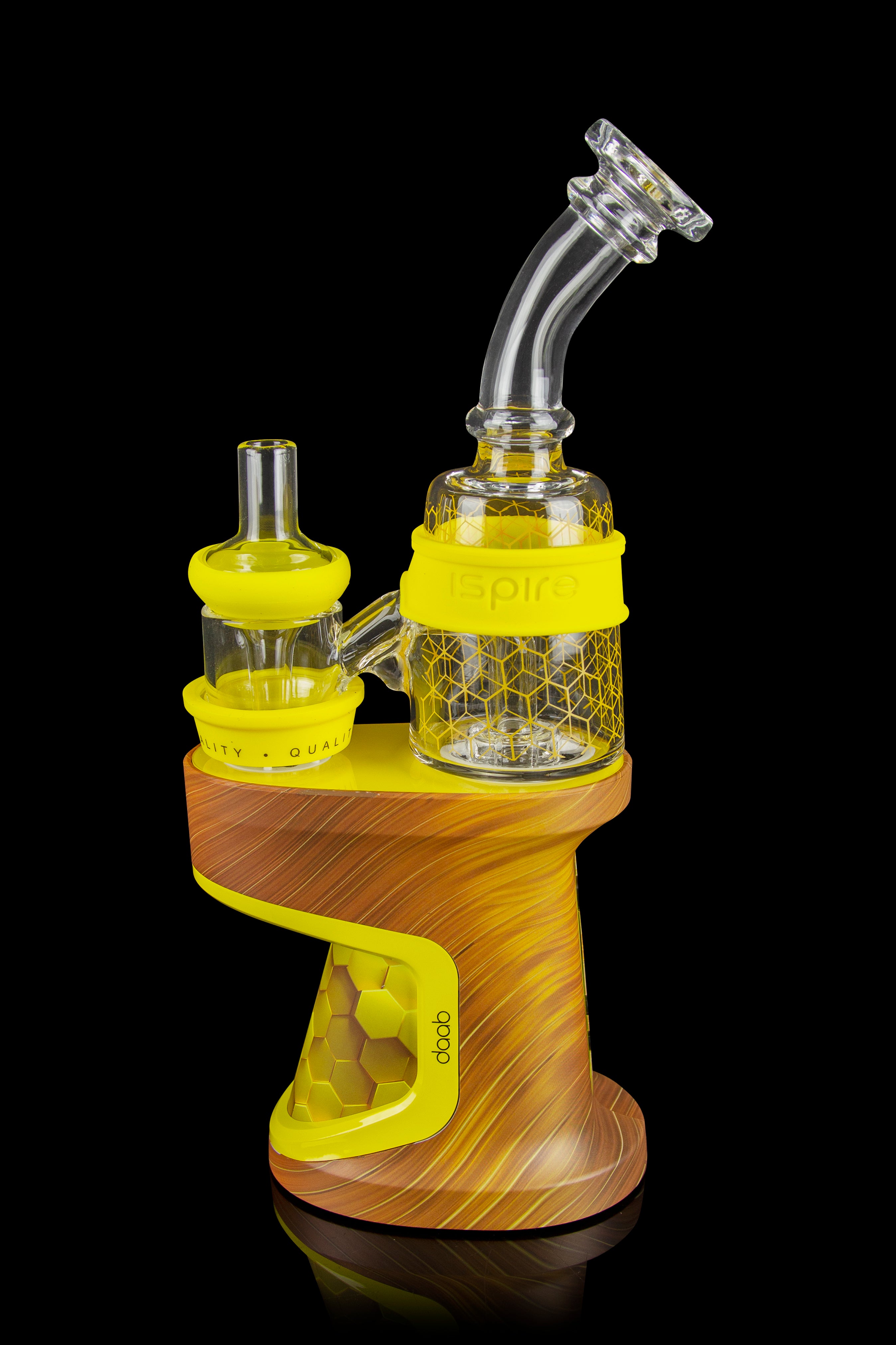 Yellow and wood-grain DabRig cannabis vaporizer with glass water pipe attachment.<start_of_image>