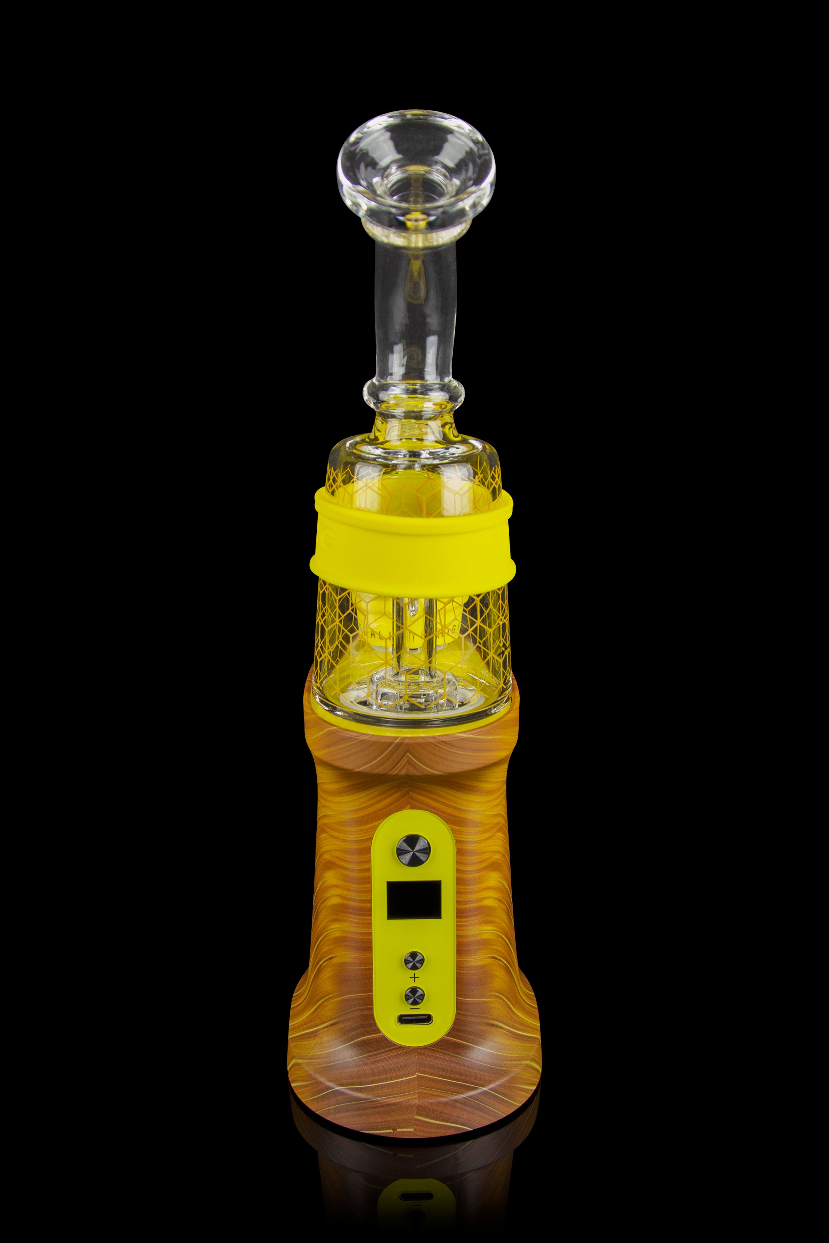 A modern, electronic dab rig with a glass bubbler and amber-colored base, displayed against a black background.