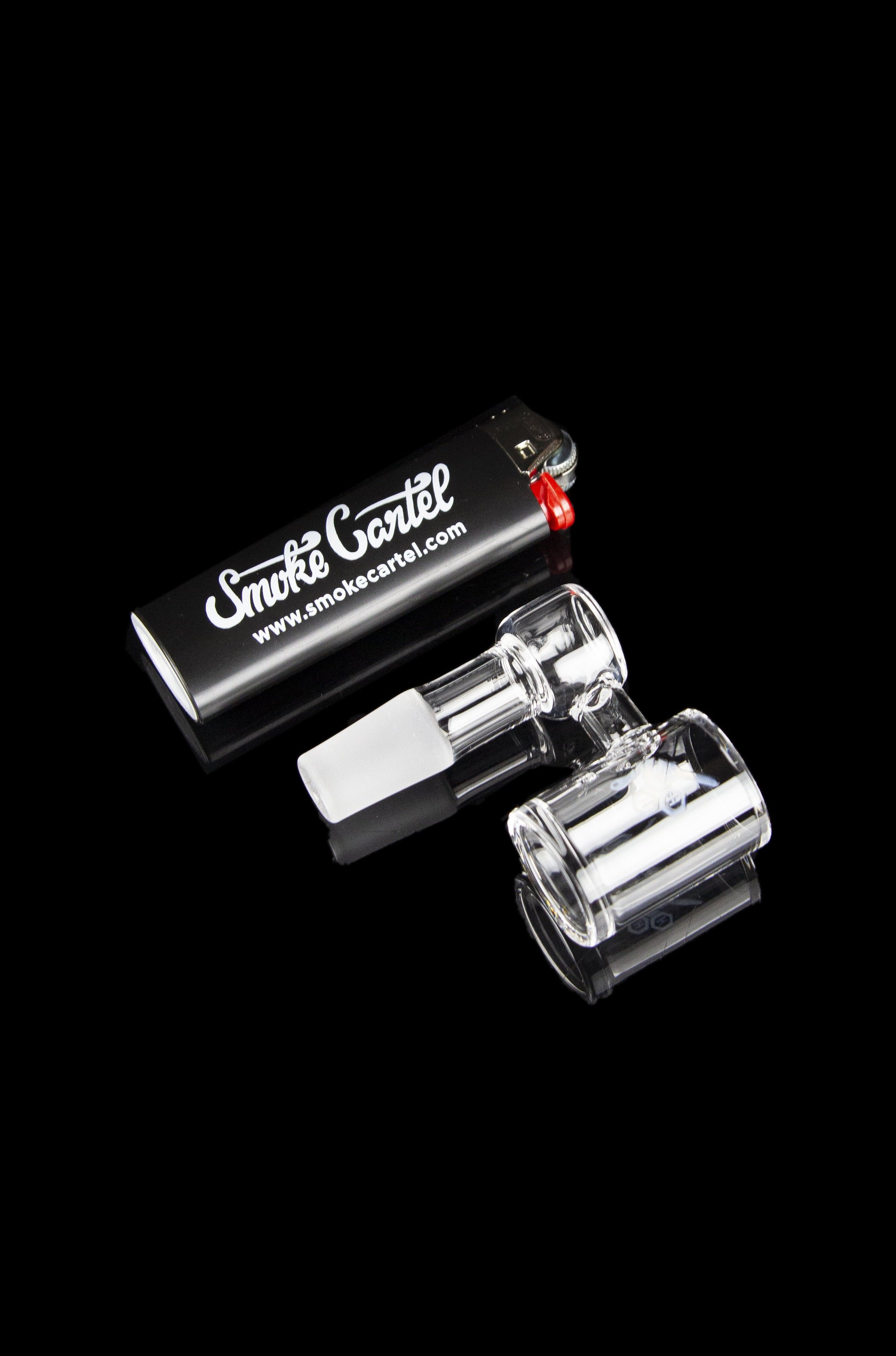 Clear glass dab rig with a branded box.