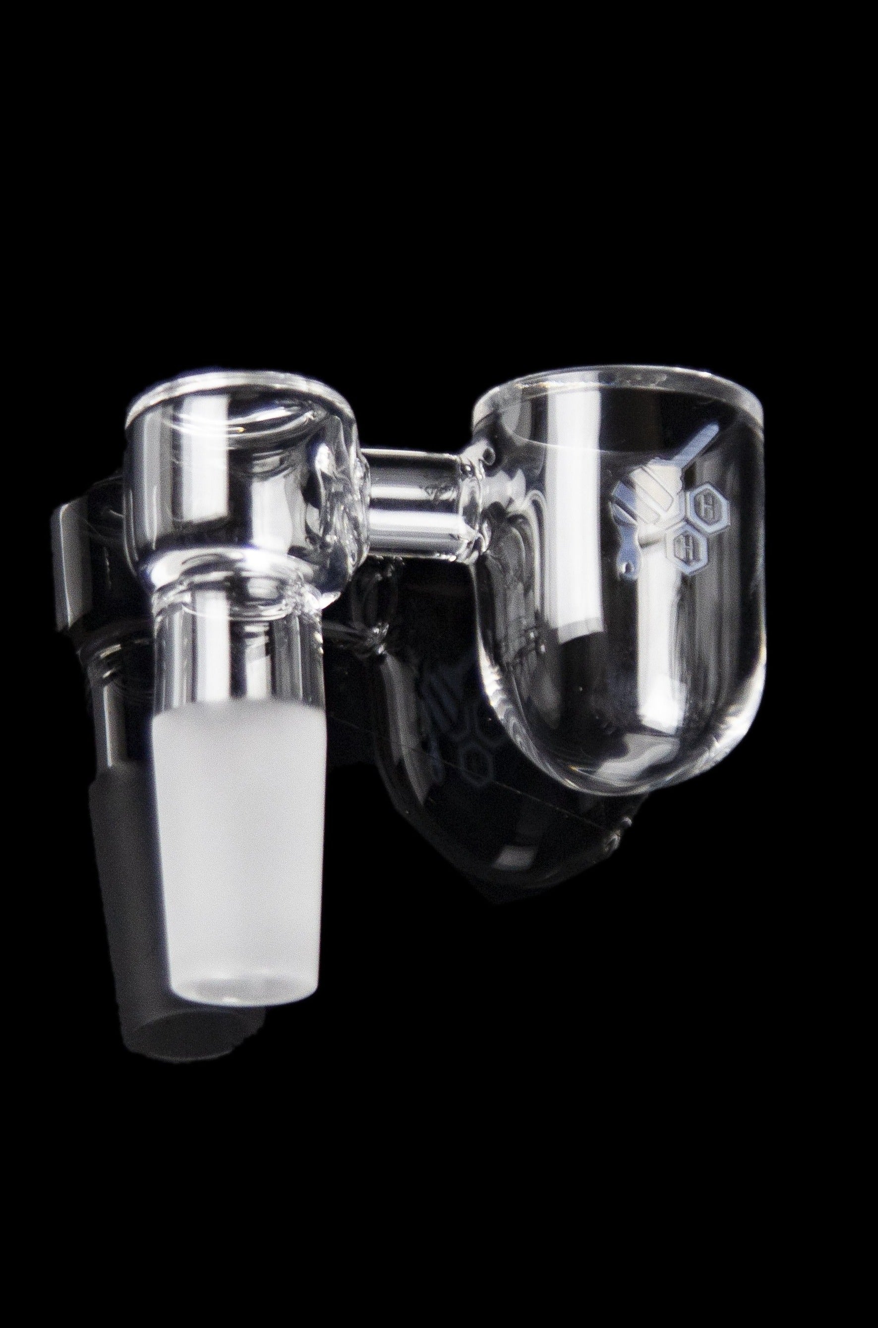 Clear quartz banger with a carb cap for vaporizing cannabis concentrates.