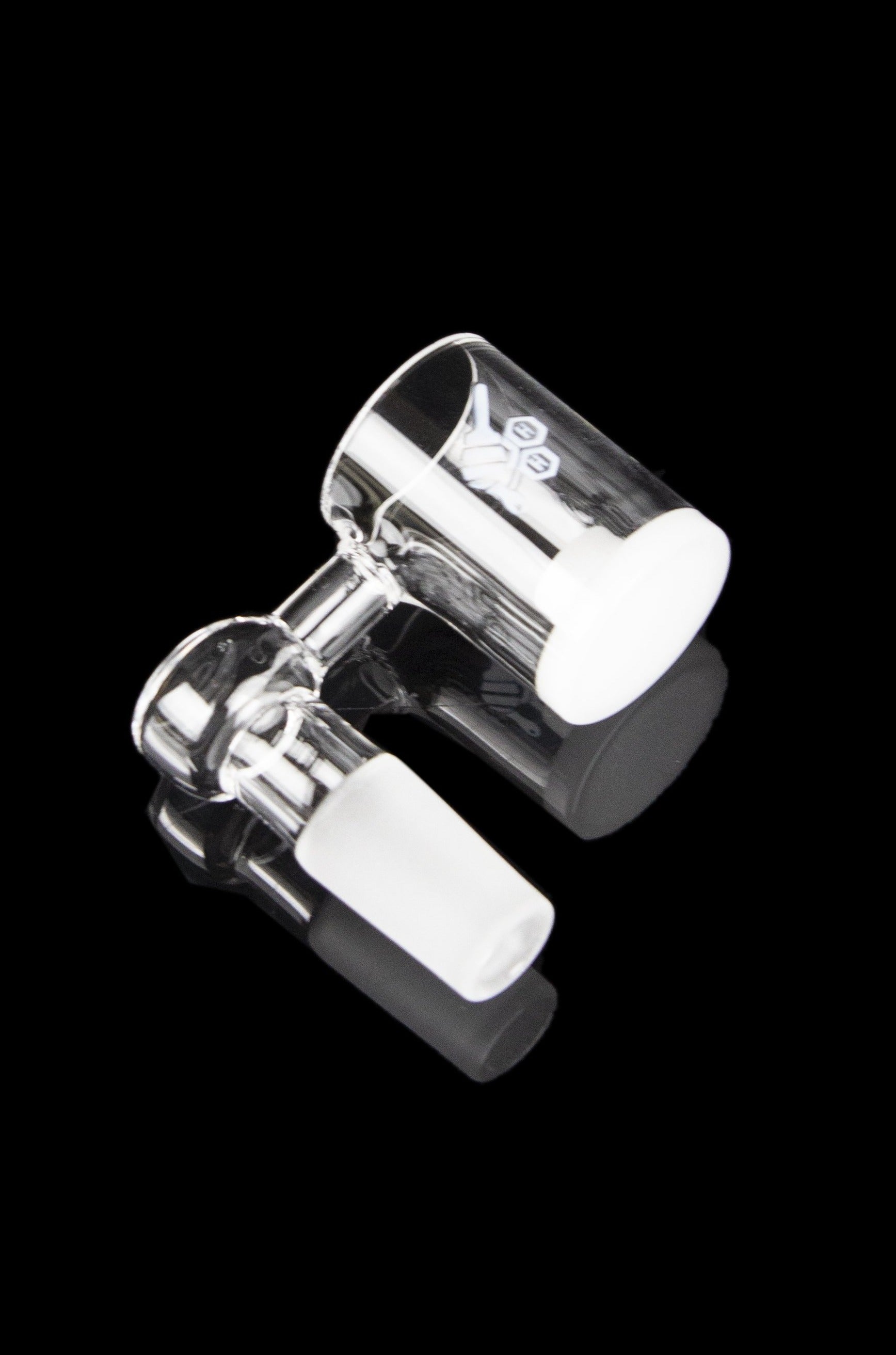 Clear glass dab rig with black accents, isolated on a black background.