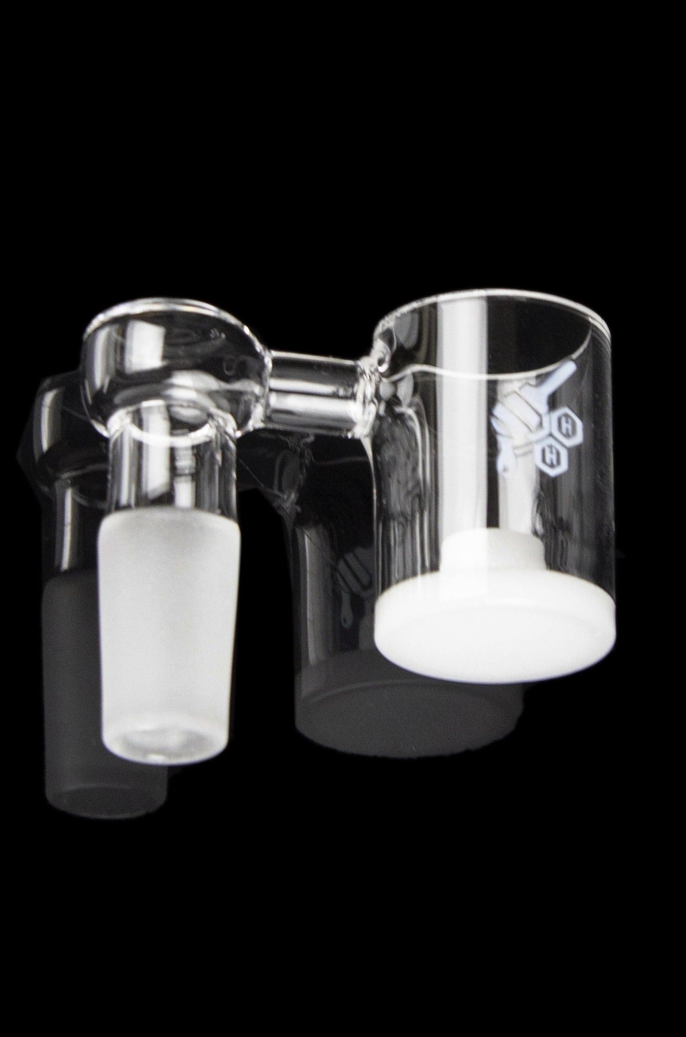 Clear glass dab rig inserts with white ceramic bowls, isolated on a black background.